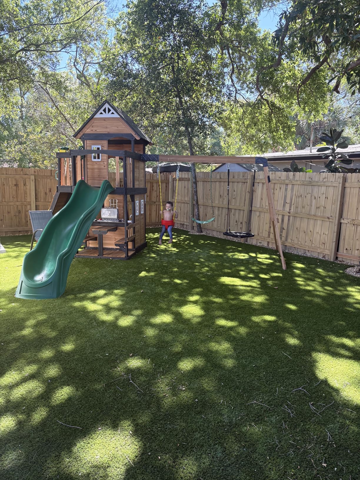 Backyard Discovery Canyon Creek Cedar Wood Swing Set with Wave Slide, Clubhouse, Play Kitchen, Picnic Area, Belt Swings, Web Swing, Rock Wall, Balconies, Playhouse, Step Ladder, Outdoor Playset customer photo 1