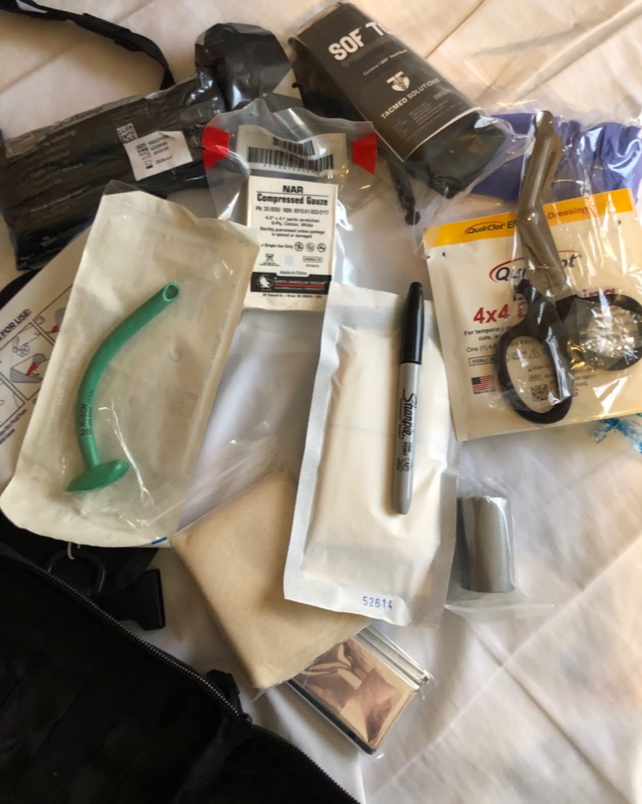 Scherber Premium IFAK Kit Trauma Pack | HSA/FSA Approved | SOF Tourniquet, QuikClot 4x4 HyFin Chest Seal, Israeli Bandage | Fully Stocked MOLLE Pouch for Gunshot, Bleeding, Major Wound Care (Black) customer photo 1