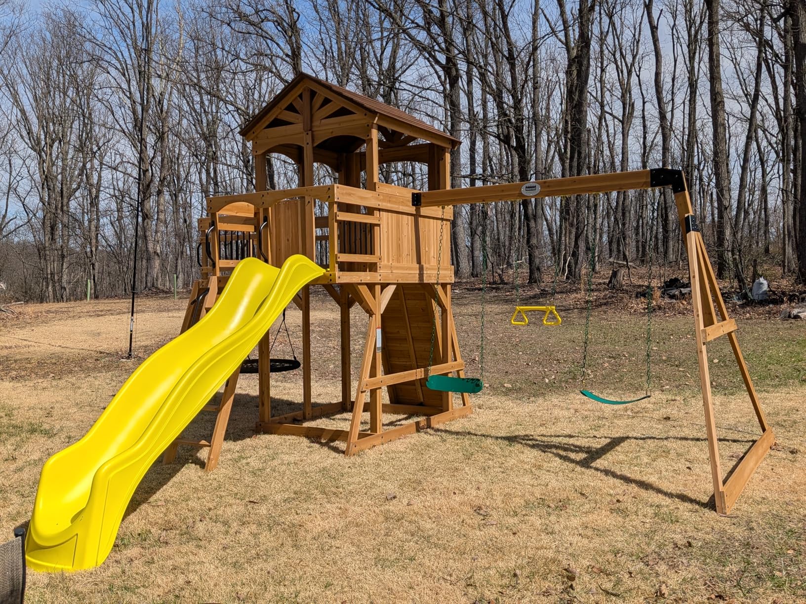 Backyard Discovery Sterling Point Cedar Wood Swing Set with Wave Slide, Raised Clubhouse, Wooden Bridge, Rock Wall, Belt Swings, Web Swing, Trapeze, Balcony, Climbing Wall, Ladder, Outdoor Playset customer photo 1