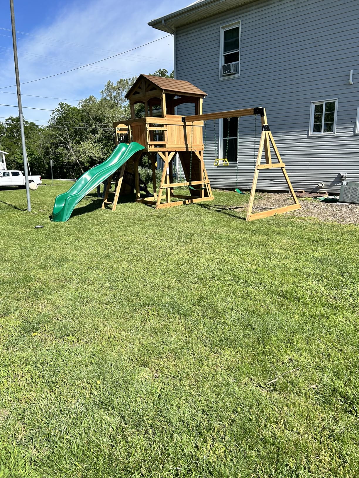 Backyard Discovery Sterling Point Cedar Wood Swing Set with Wave Slide, Raised Clubhouse, Wooden Bridge, Rock Wall, Belt Swings, Web Swing, Trapeze, Balcony, Climbing Wall, Ladder, Outdoor Playset customer photo 2