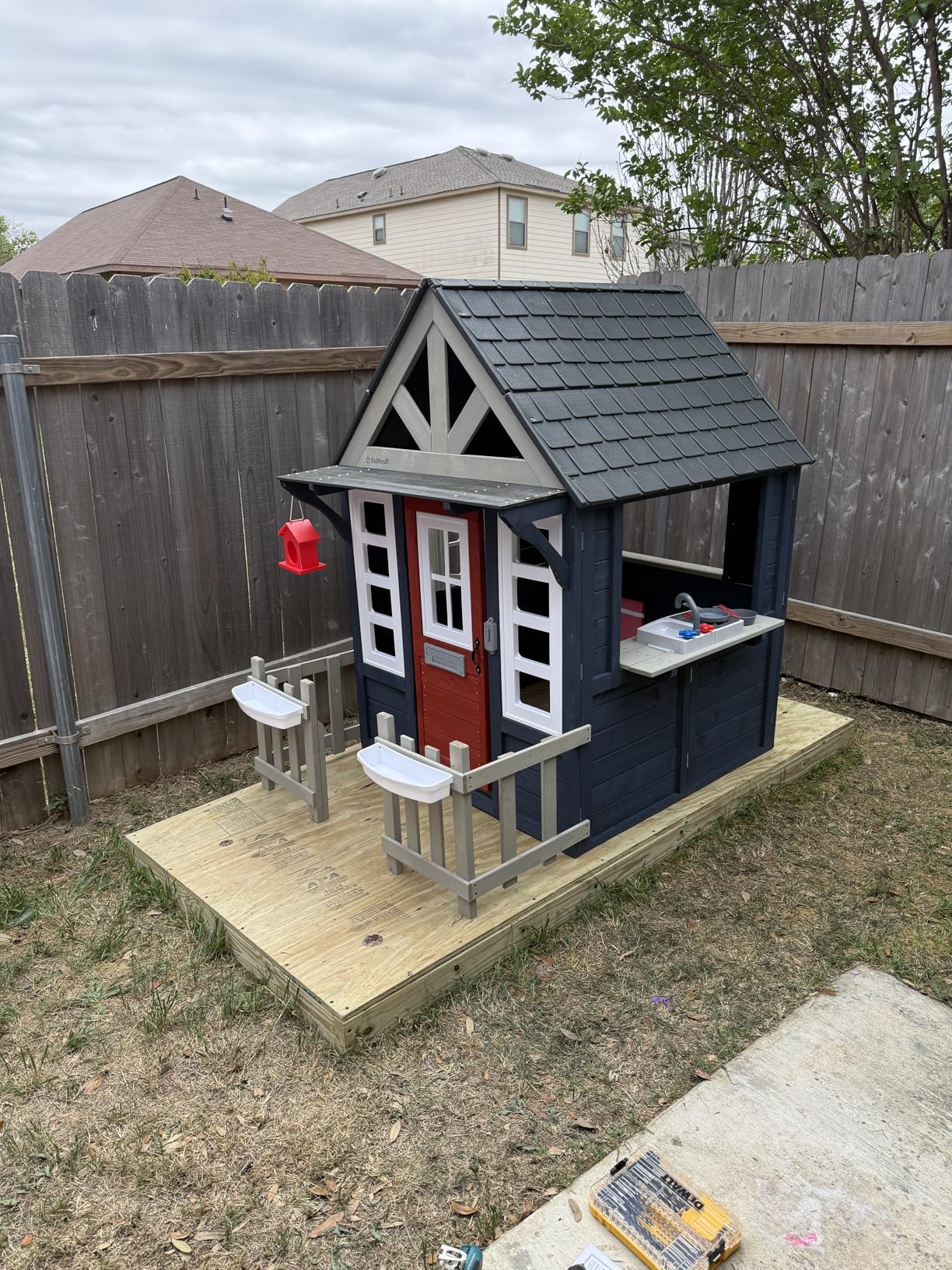 KidKraft Riverscape Wooden Playhouse with Working Doorbell, Fence, Kitchen and Pet Door customer photo 2