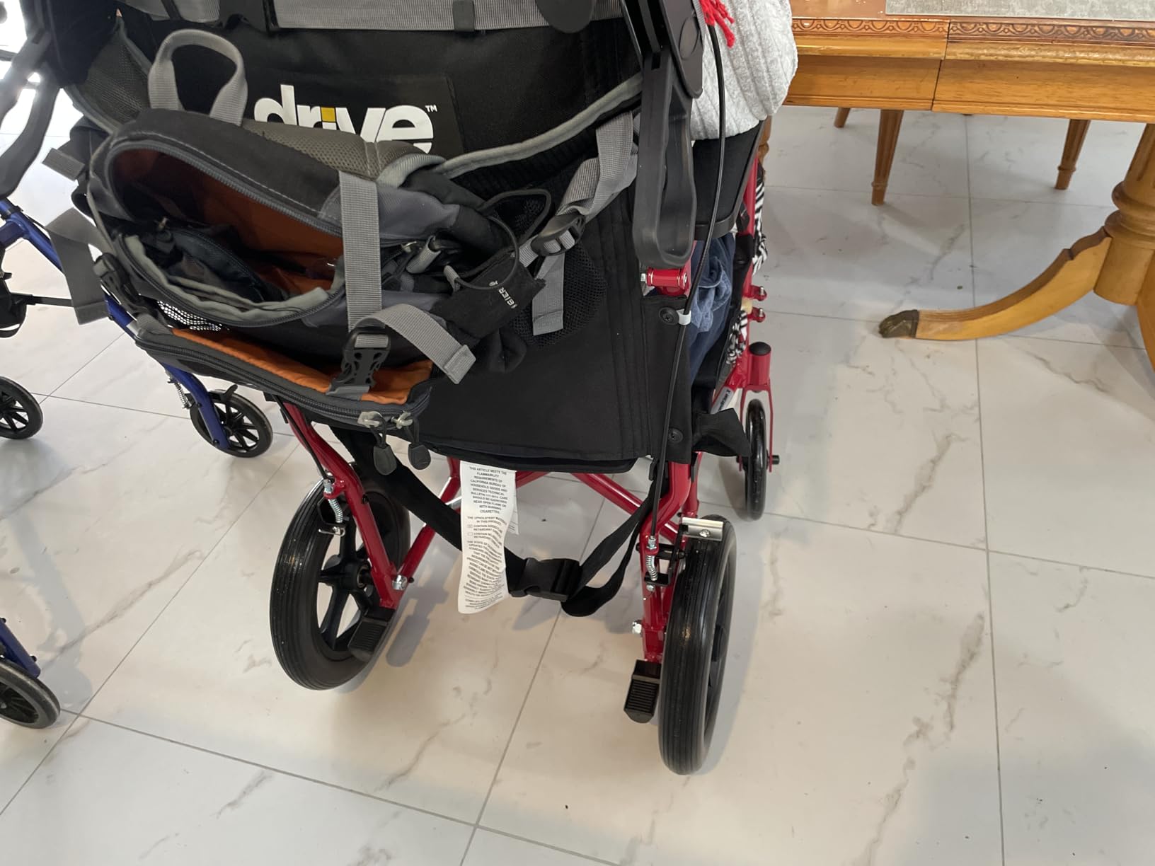 Drive Medical Lightweight Expedition Folding Transport Wheelchair - Ultra Lightweight Mobility Support for Seniors & Adults - Strong Aluminum Frame - Hand Brakes - Compact Folding Travel Chair - Red customer photo 2