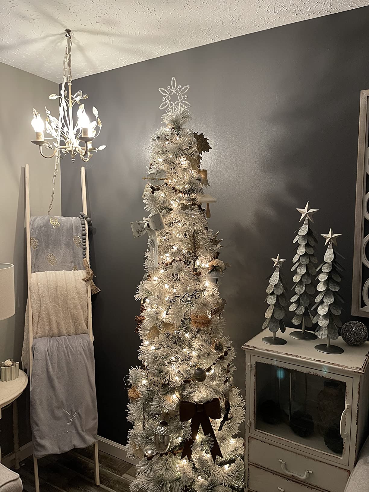 Puleo International 9ft Pre-Lit Flocked Portland Pine Pencil Christmas Tree with 450 Clear Lights, 623 Realistic Dense Snow Flocked Branch Tips, Easy Setup Artificial Trees with Sturdy Metal Stand customer photo 1