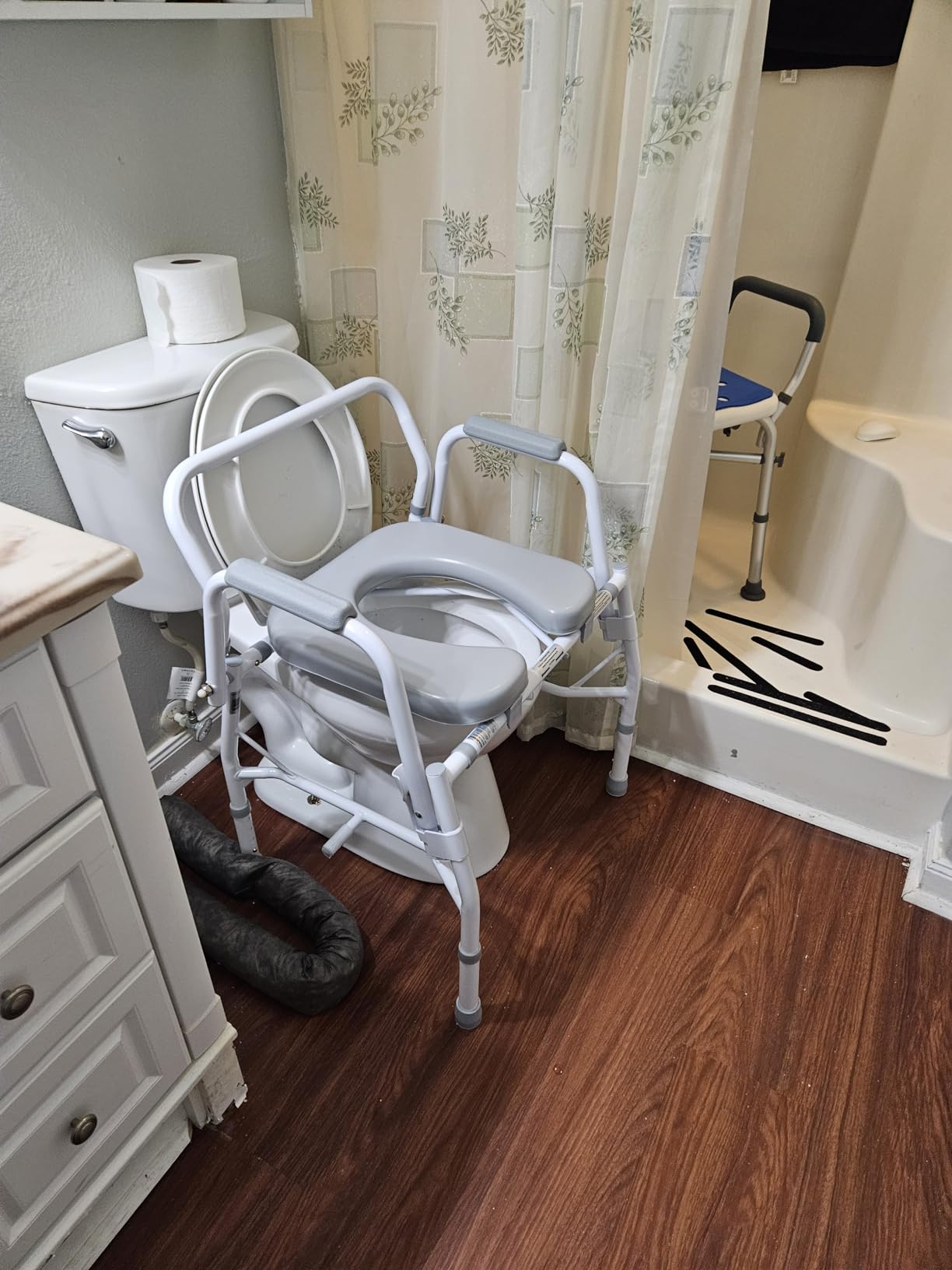 Medline Drop Arm Commode Chair for Adults and Seniors, Padded Seat, Removable Pail customer photo 1