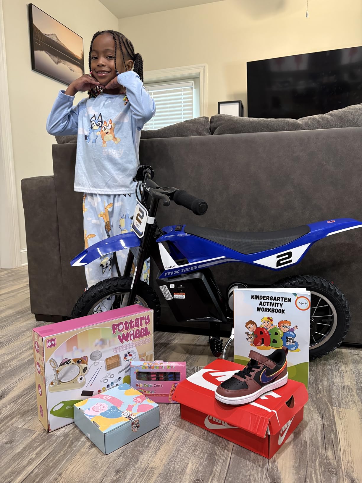 Razor MX125 Dirt Rocket Electric-Powered Bike with Authentic Motocross Geometry, Rear-Wheel Drive, 100-watt, high-Torque, Chain-Driven Motor, for Kids 7+ customer photo 2