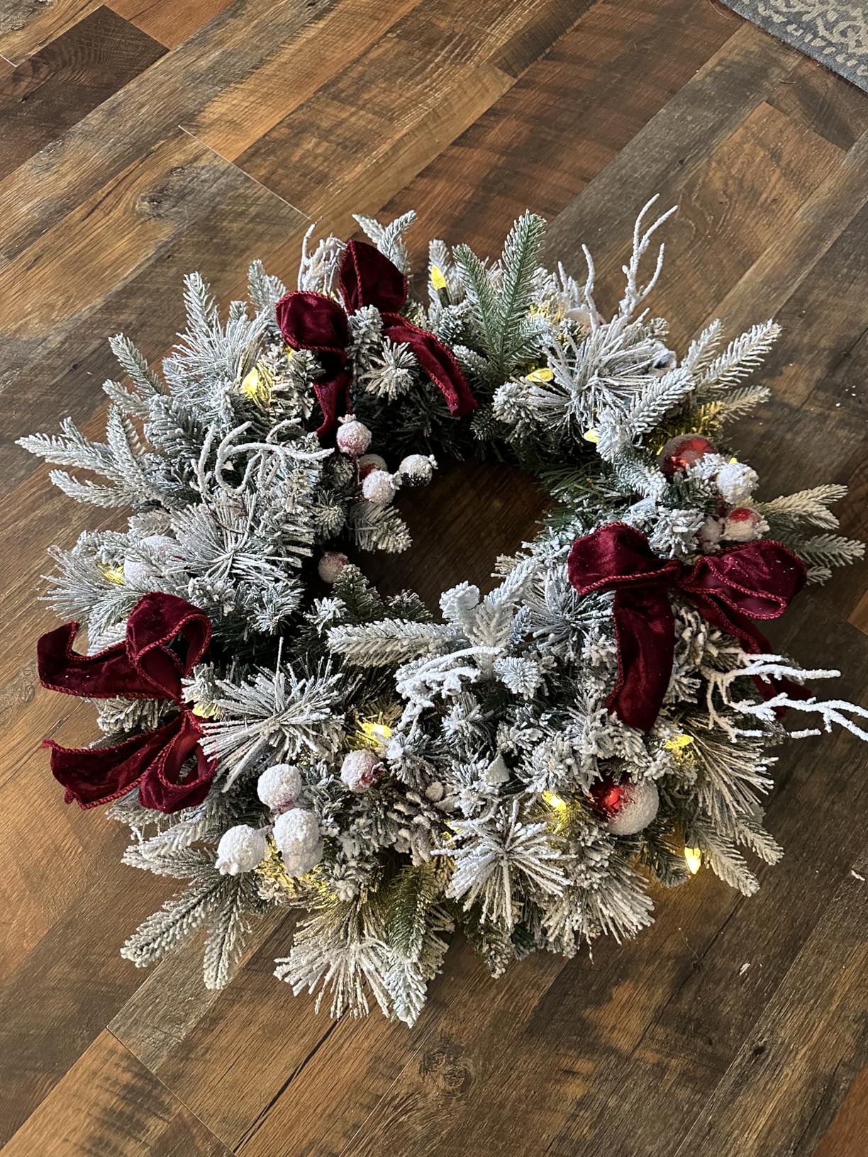 Pre-lit Snow Christmas Wreath with Red Balls, Berries and Bows, 24 Inch 50 Battery Operated LED Lights, Holiday Decoration for Front Door Outdoor customer photo 2