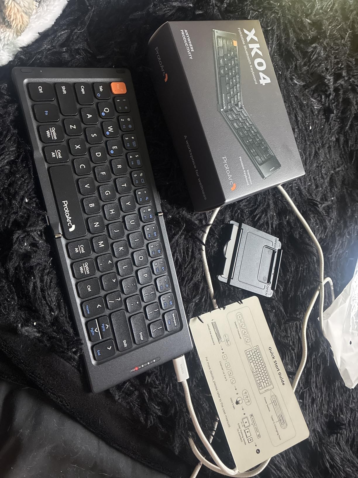 ProtoArc Foldable Compact Keyboard, XK04 Portable Bluetooth Keyboard with PU Leather Cover, Pocket-Sized Wireless Travel Keyboards for iPad, iPhone, Smartphone, Tablet and Laptop - Black customer photo 1