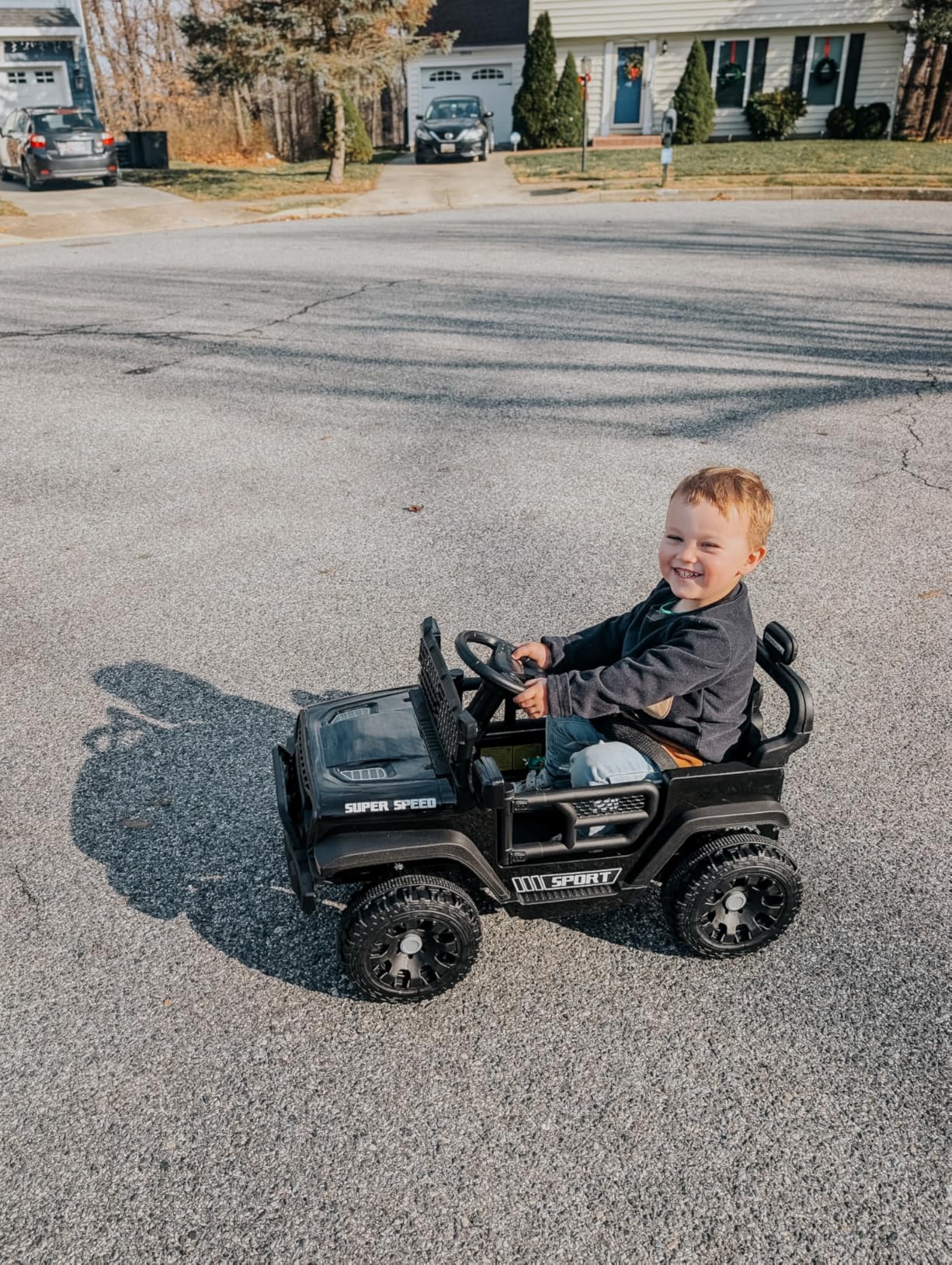 12V Ride on Car with Parent Remote Control, Toddler Electric Car with Spring Suspension, LED Lights & Music Player - Safe Battery Toy for Kids, Christmas & Birthday Gift, Black customer photo 1