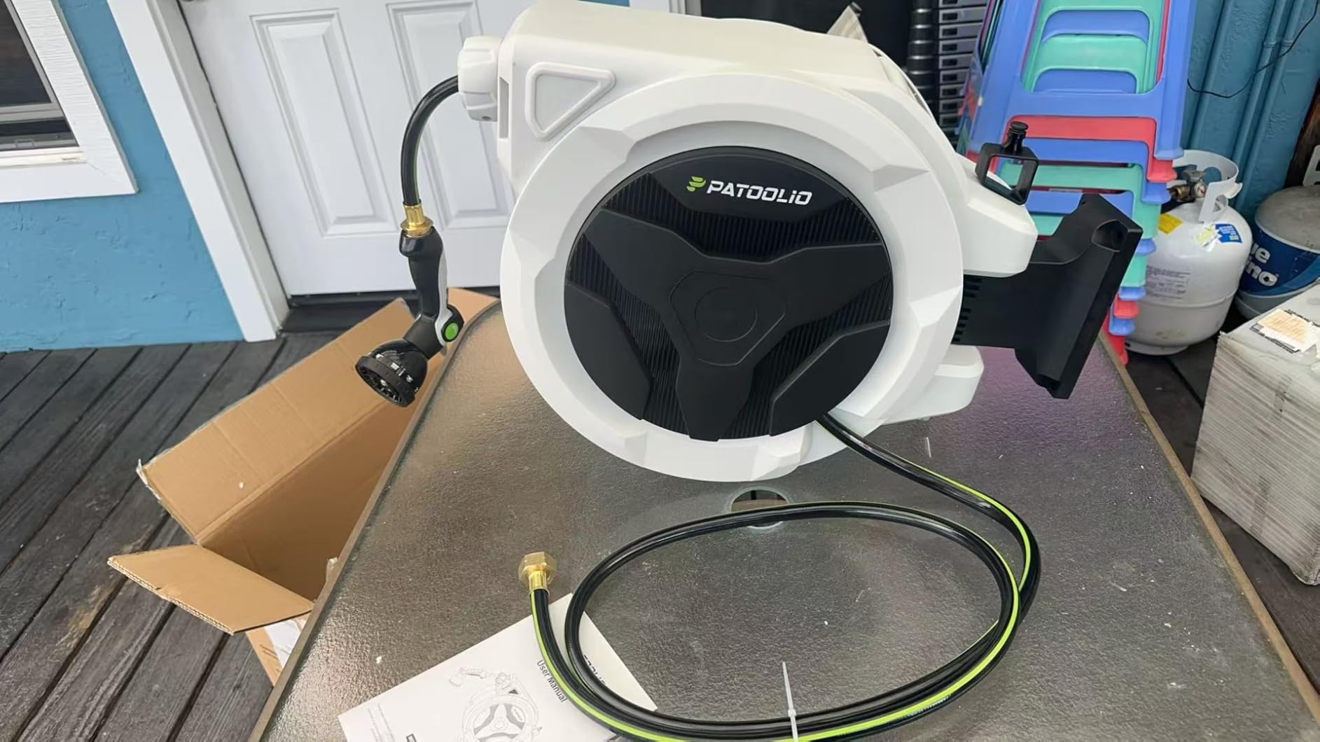 Retractable Hose Reel 1/2 in x 100 ft, Heavy Duty Wall Mounted Garden Hose Reel with 10-Pattern Nozzle, Any Length Lock, Automatic Slow Return System, 180° Swivel Bracket, UV Resistant 2026 Upgraded customer photo 1