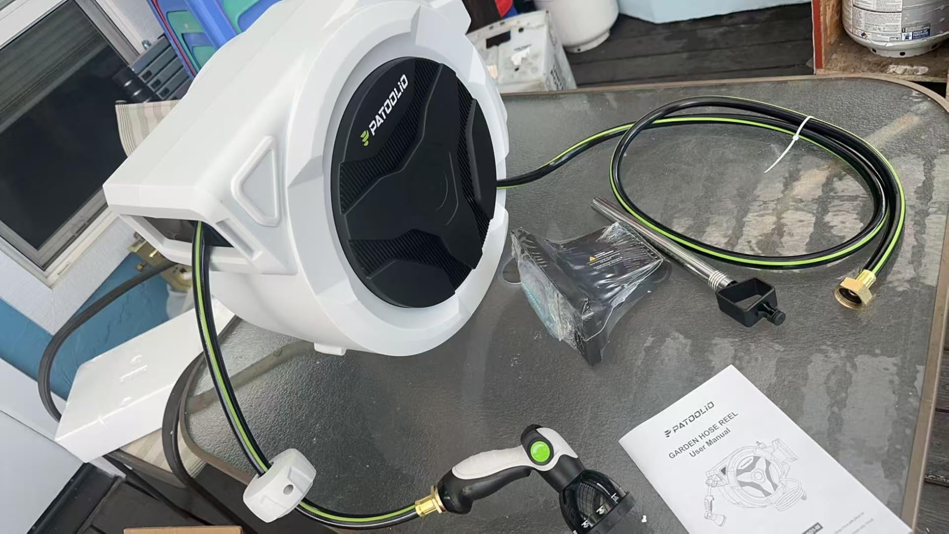 Retractable Hose Reel 1/2 in x 100 ft, Heavy Duty Wall Mounted Garden Hose Reel with 10-Pattern Nozzle, Any Length Lock, Automatic Slow Return System, 180° Swivel Bracket, UV Resistant 2026 Upgraded customer photo 2