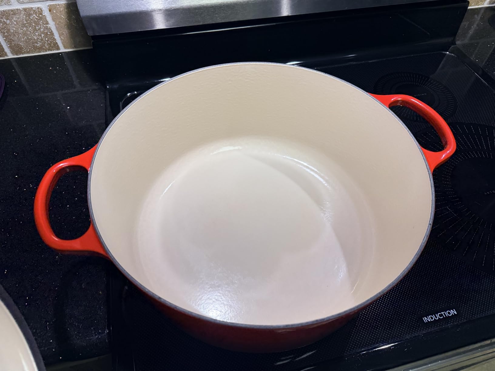 Le Creuset Enameled Cast Iron Round Dutch Oven, 4.5 qt., Cerise customer photo 2