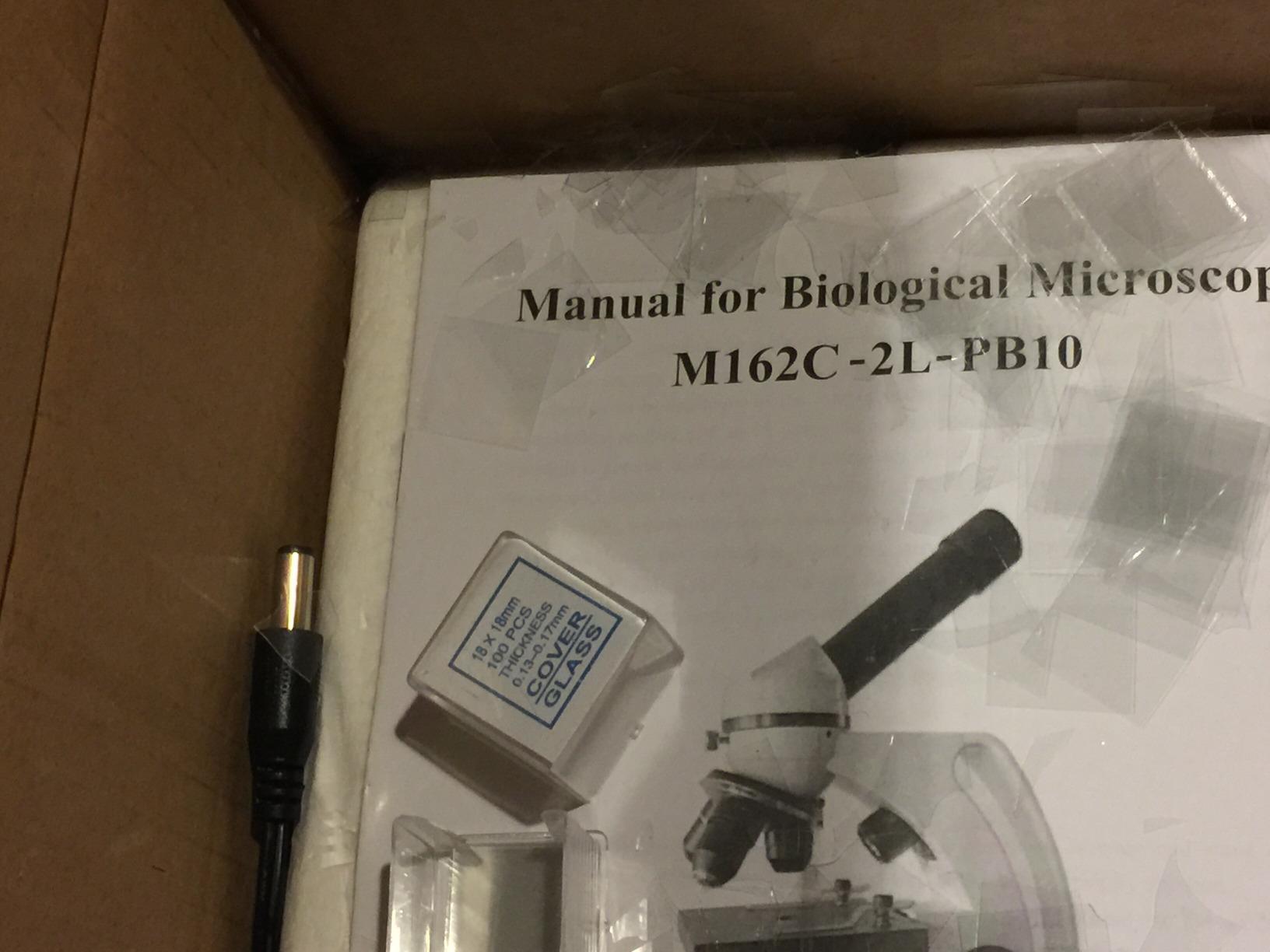 AmScope 40X-1000X Beginners Microscope Kit for Kids & Students w/ Complete Science Accessory Kit + World of the Microscope Book customer photo 1