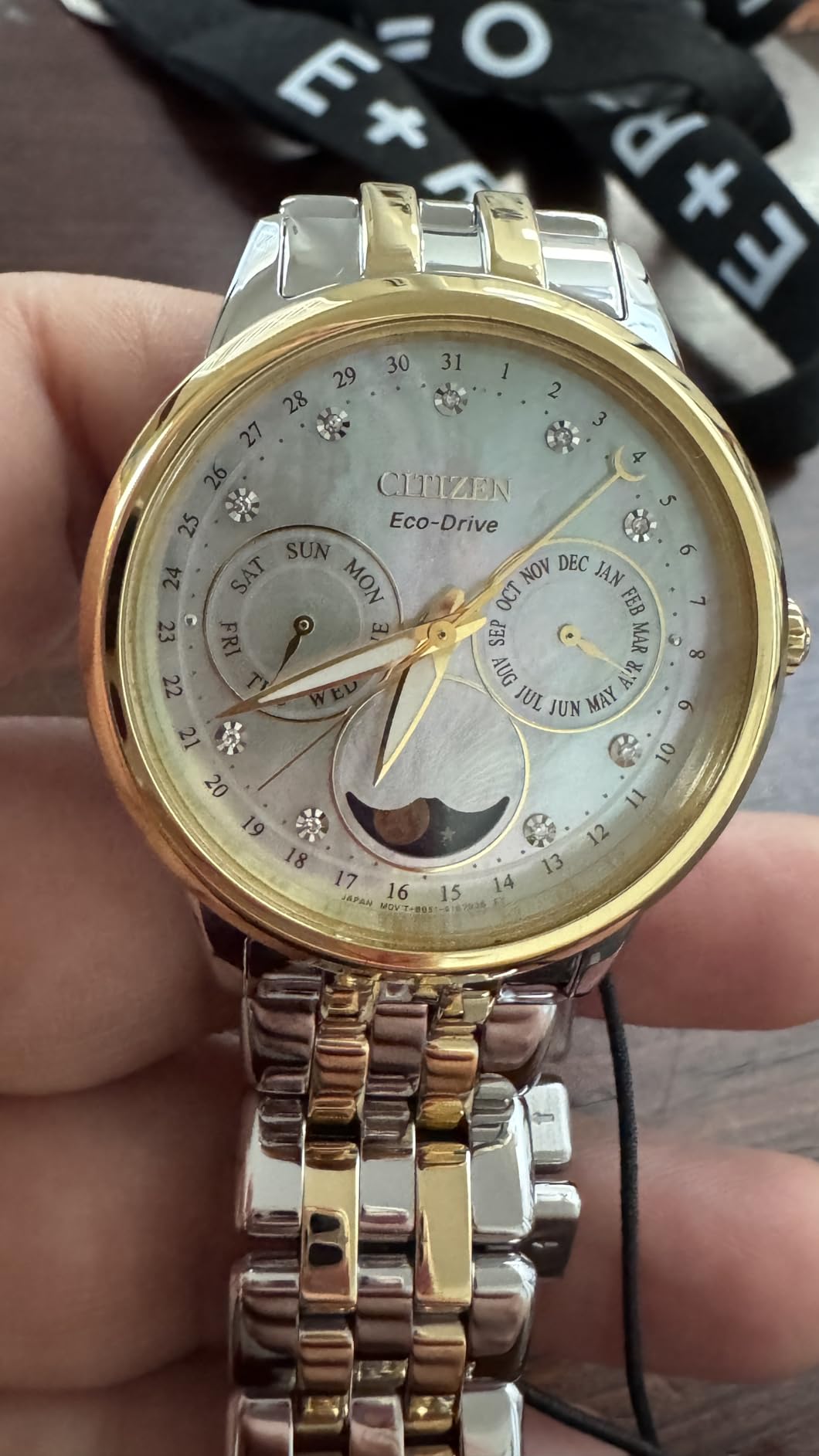 Women's Eco-Drive Calendrier, Moon Phase Diamond Accents Dial, Stainless Case and Bracelet Watch, Month/Day/Date customer photo 1