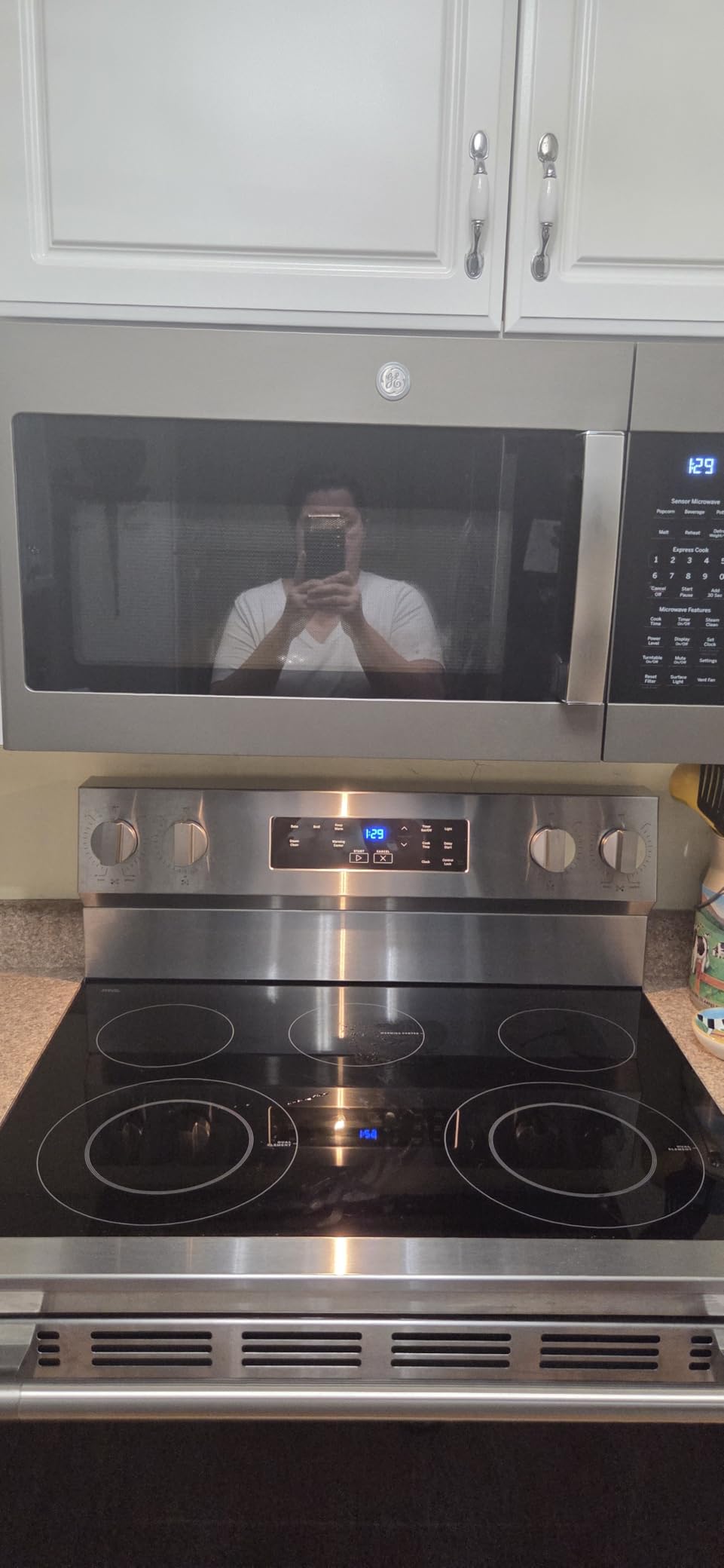 GE Over-the-Range Microwave Oven with Recirculating Venting, 1.8 Cu. FT, 900W, 12.8