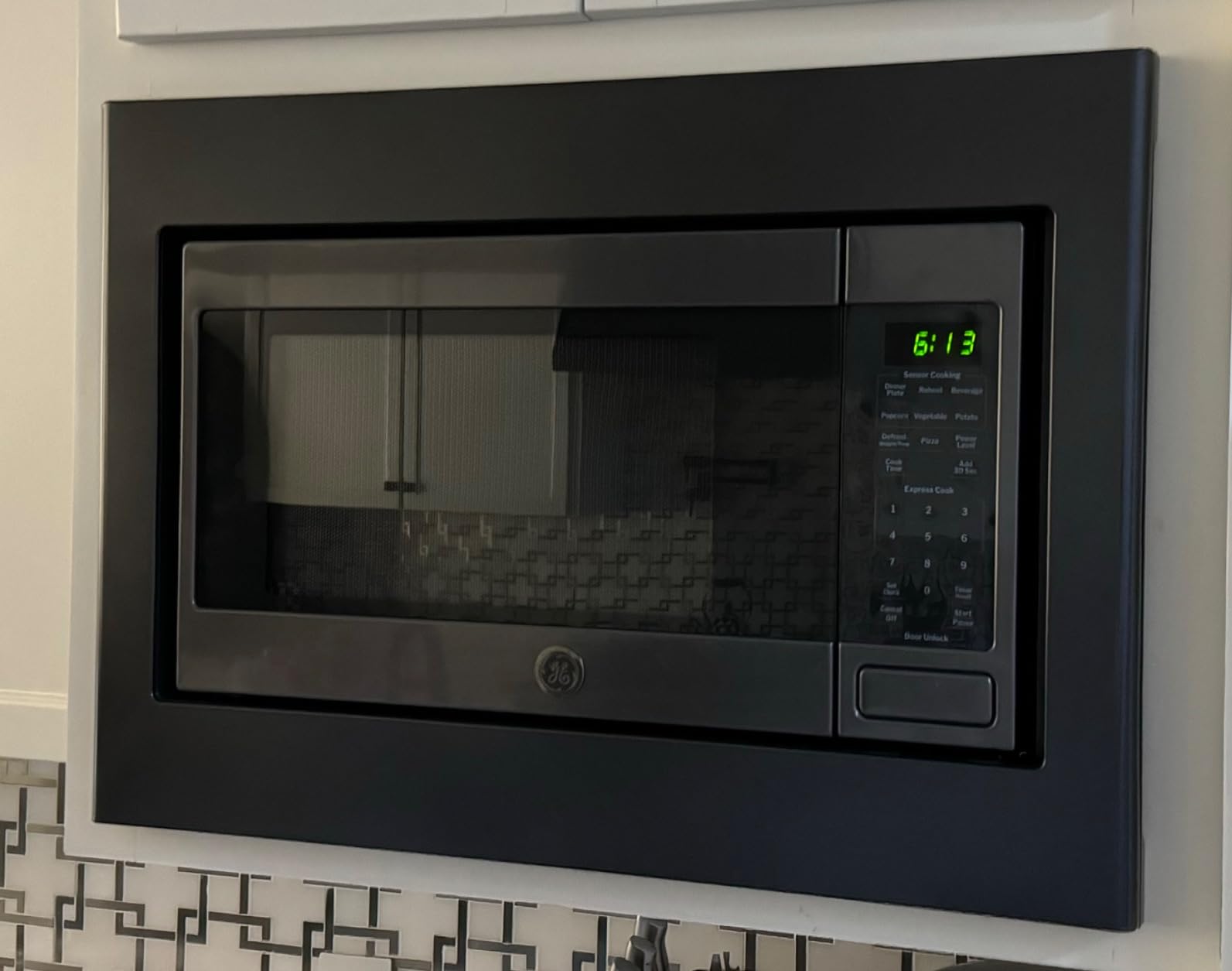 GE Countertop Microwave Oven, 1,150-watt Capacity, 1.6 Cubic Ft., 8 Auto Cooking Settings, Child-Lock Technology, Kitchen Essentials for The Countertop, Dorm Room or Apartment, Black Stainless customer photo 1