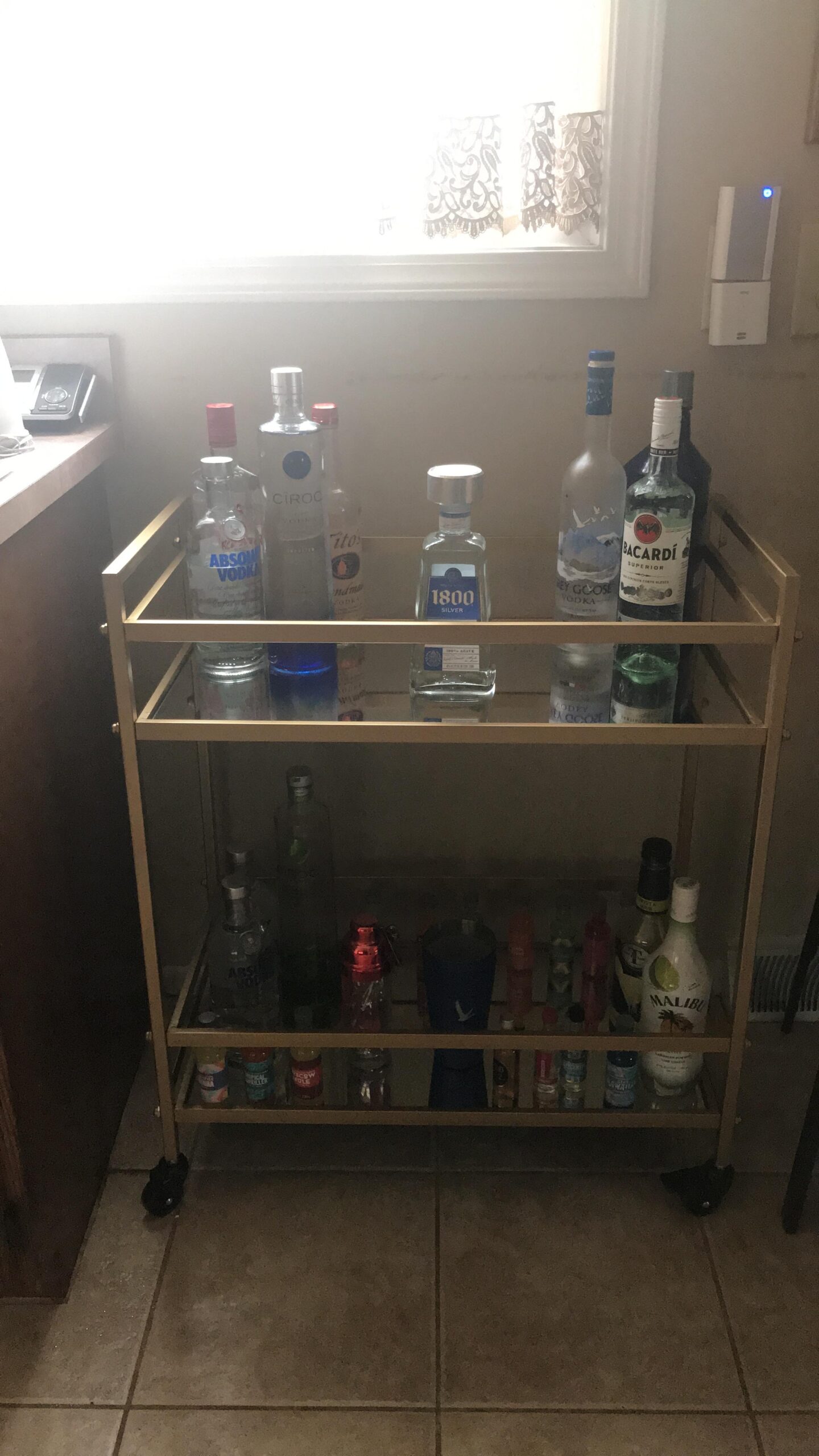 Signature Design by Ashley Plattfield Contemporary Bar Cart with Glass & Marble Shelves and Locking Casters, Antique Gold & White customer photo 2