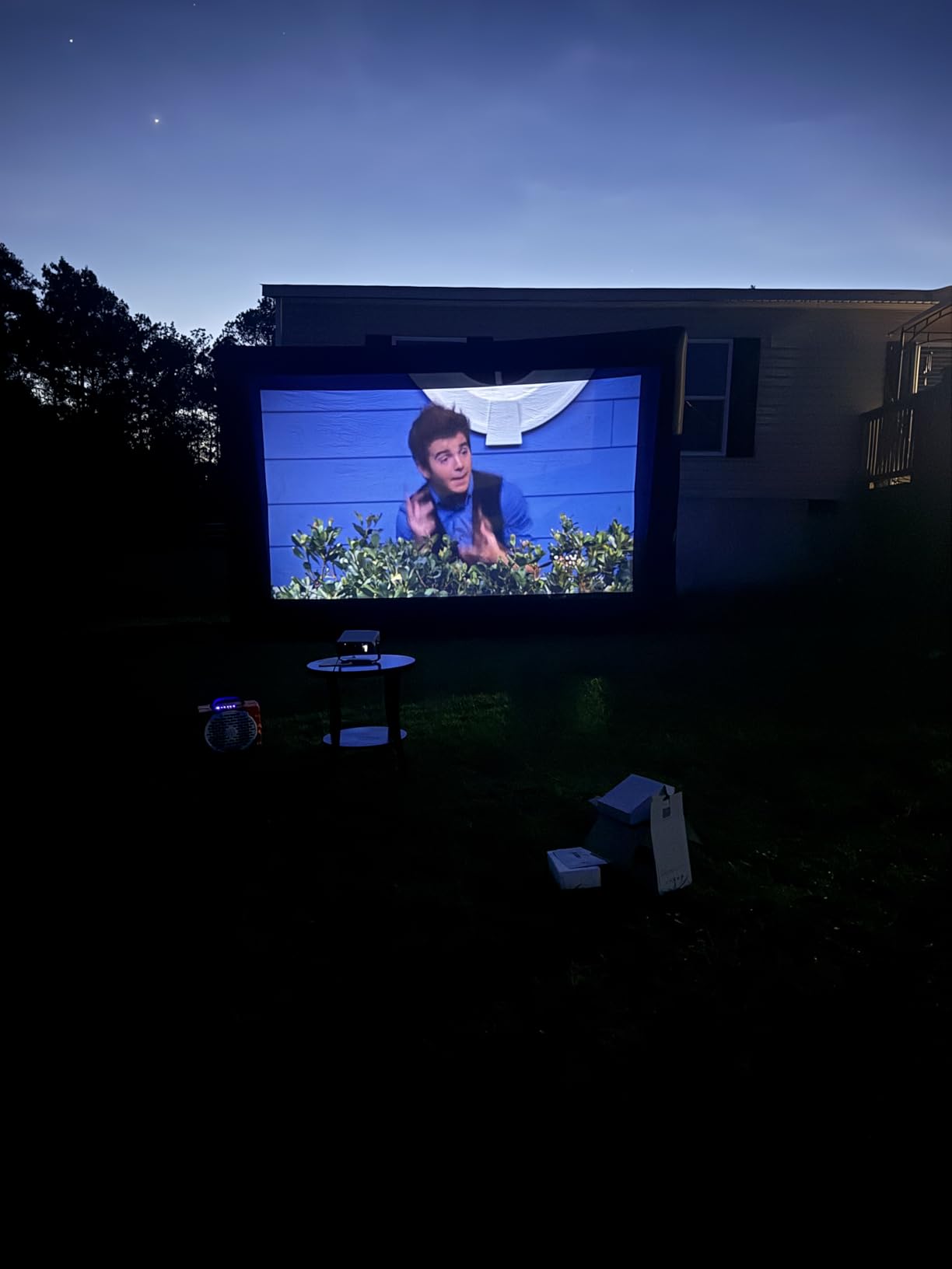 Smart 4K Projector [Bundled with Google TV Stick] with WiFi and Bluetooth, 2500ANSI, Auto Lens Cap, Portable Outdoor Movie Projector with Built-in Apps Auto Focus for Ceiling/Home Theater/Bedroom customer photo 1