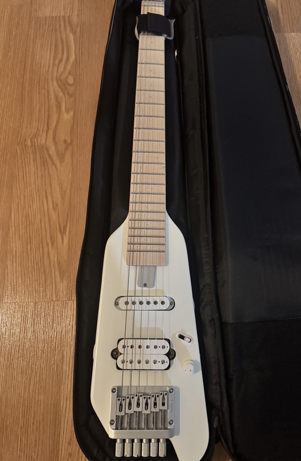 Donner HUSH-X Electric Guitar Kit - Featherlight Travel Guitar with Easy Assemble Stands, Great for Travel and Practice, Mahogany Solid Body, Gig Bag, All Accessories, Metallic White customer photo 1