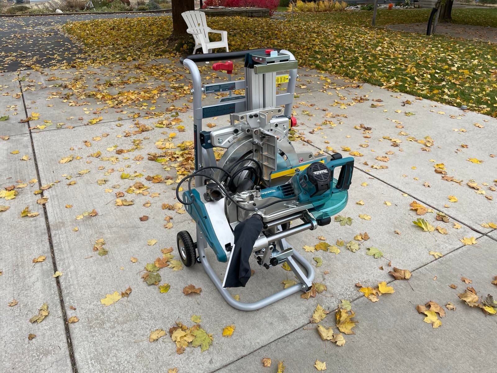 BOSCH T4B Gravity-Rise Miter Saw Stand with Wheels for Miter Saws | Integrated out feed and supports, up to 16 ft. of material support capacity, adjustable out feed, up to 12 in. in height=