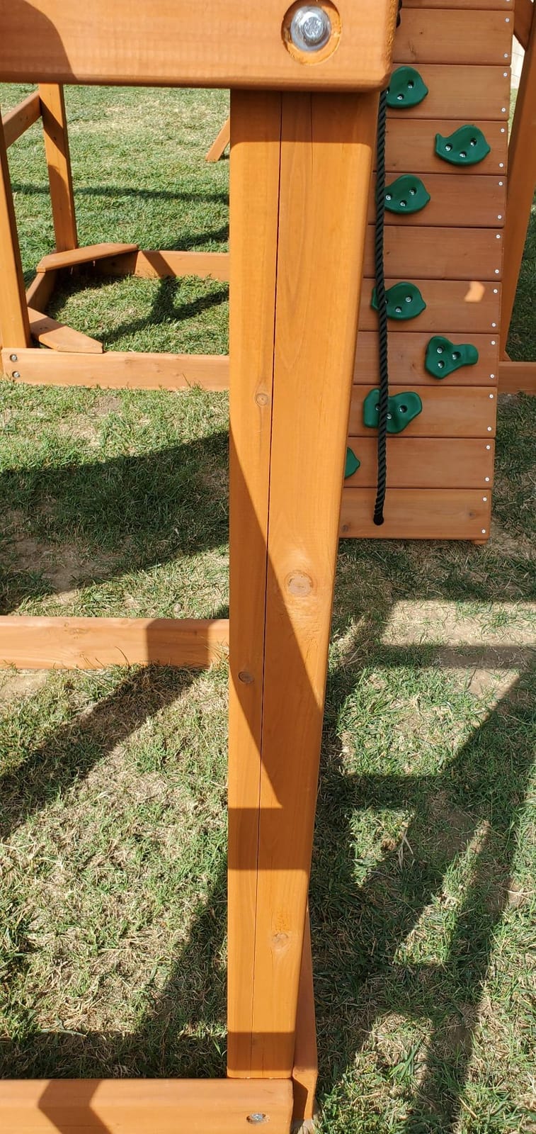 Gorilla Playsets 01-0006-AP Pioneer Peak Wood Swing Set with Wood Roof, Tire Swing, Clatter Bridge and Tower, Ramp, Slide, Two Swings, Amber customer photo 2