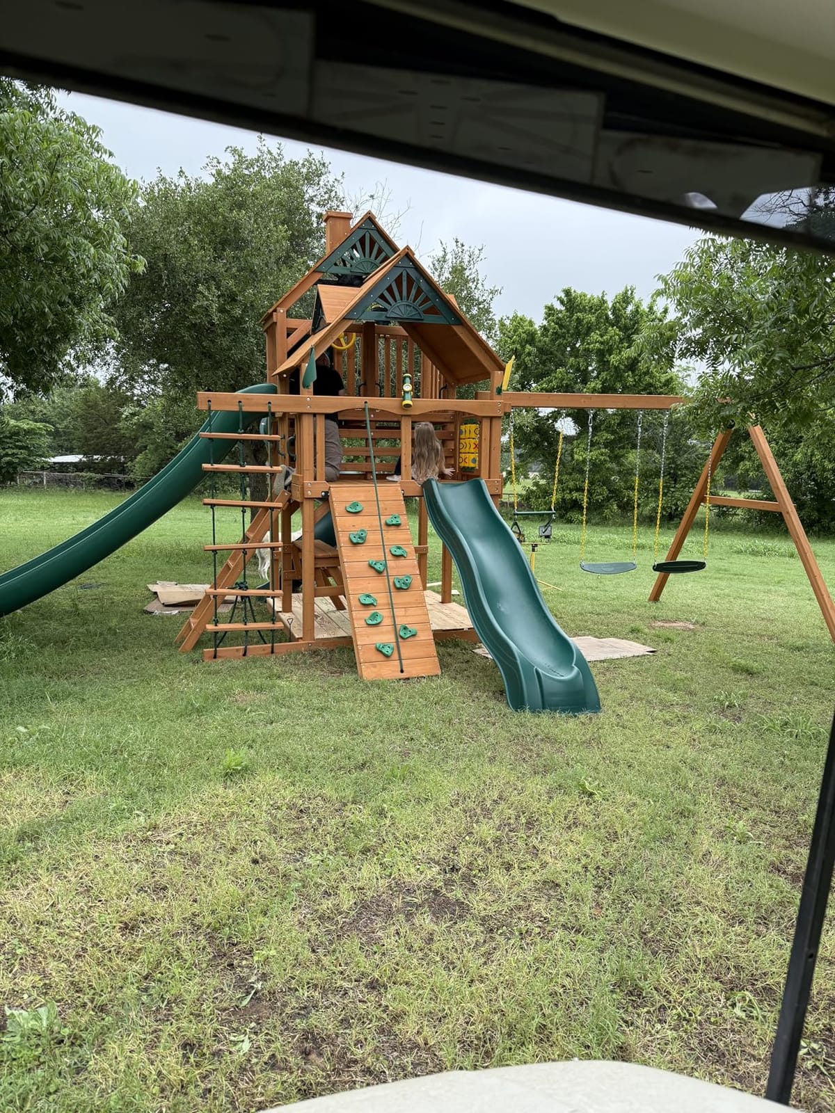 01-0031-AP Great Skye II Wood Swing Set with Wood Roof, 3 Slides, and Rock Wall, Brown customer photo 2