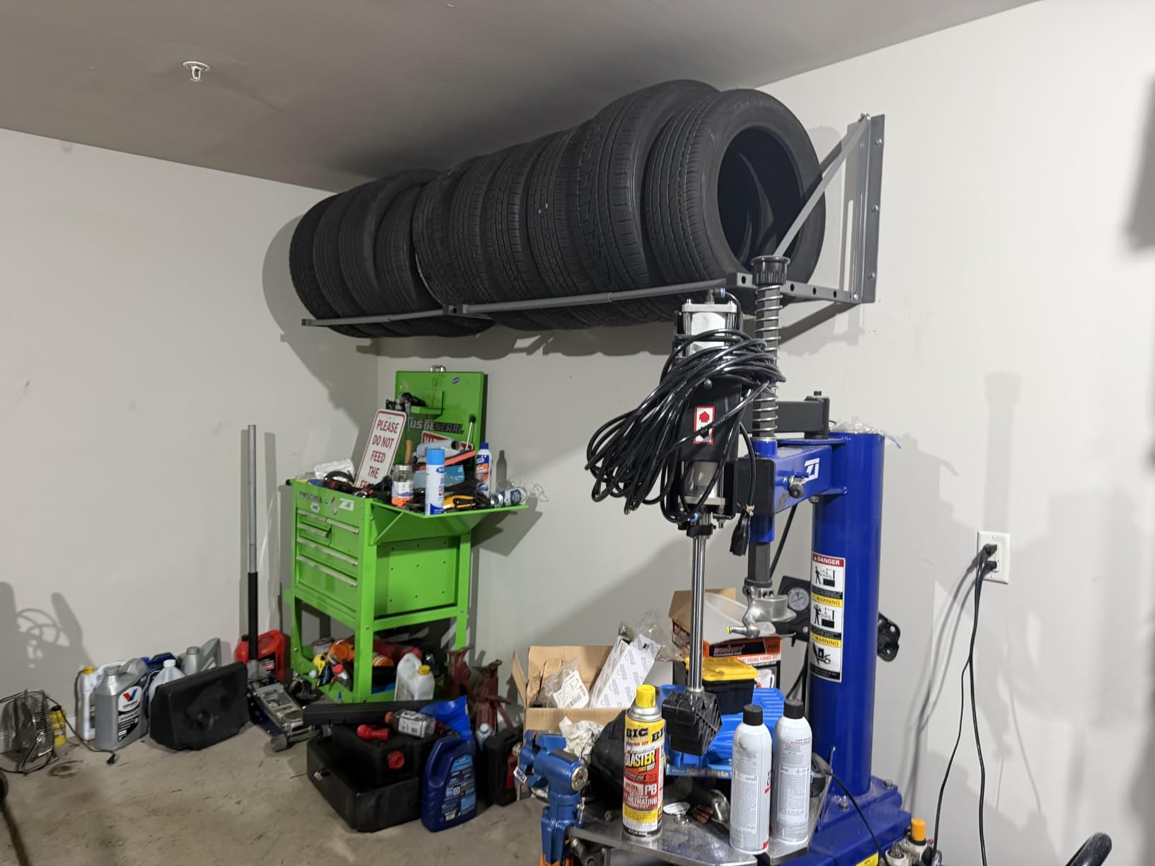 MaxxHaul Adjustable Wall Mount Folding Tire Rack - 32 to 48 Inch Width - 300 lb Capacity - Heavy Duty Steel Garage Tire Storage Holds 4 Tires - 70489 customer photo 2