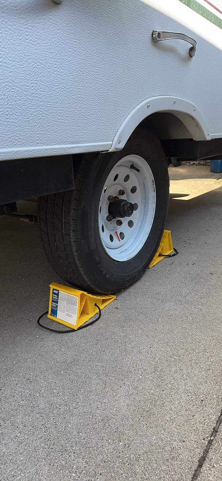 Camco RV Wheel Chocks with Rope - 2-Pack - Made in the USA | Keeps Trailer in-Place to Safely Unhitch - Compatible w/ Wheels Up to 26