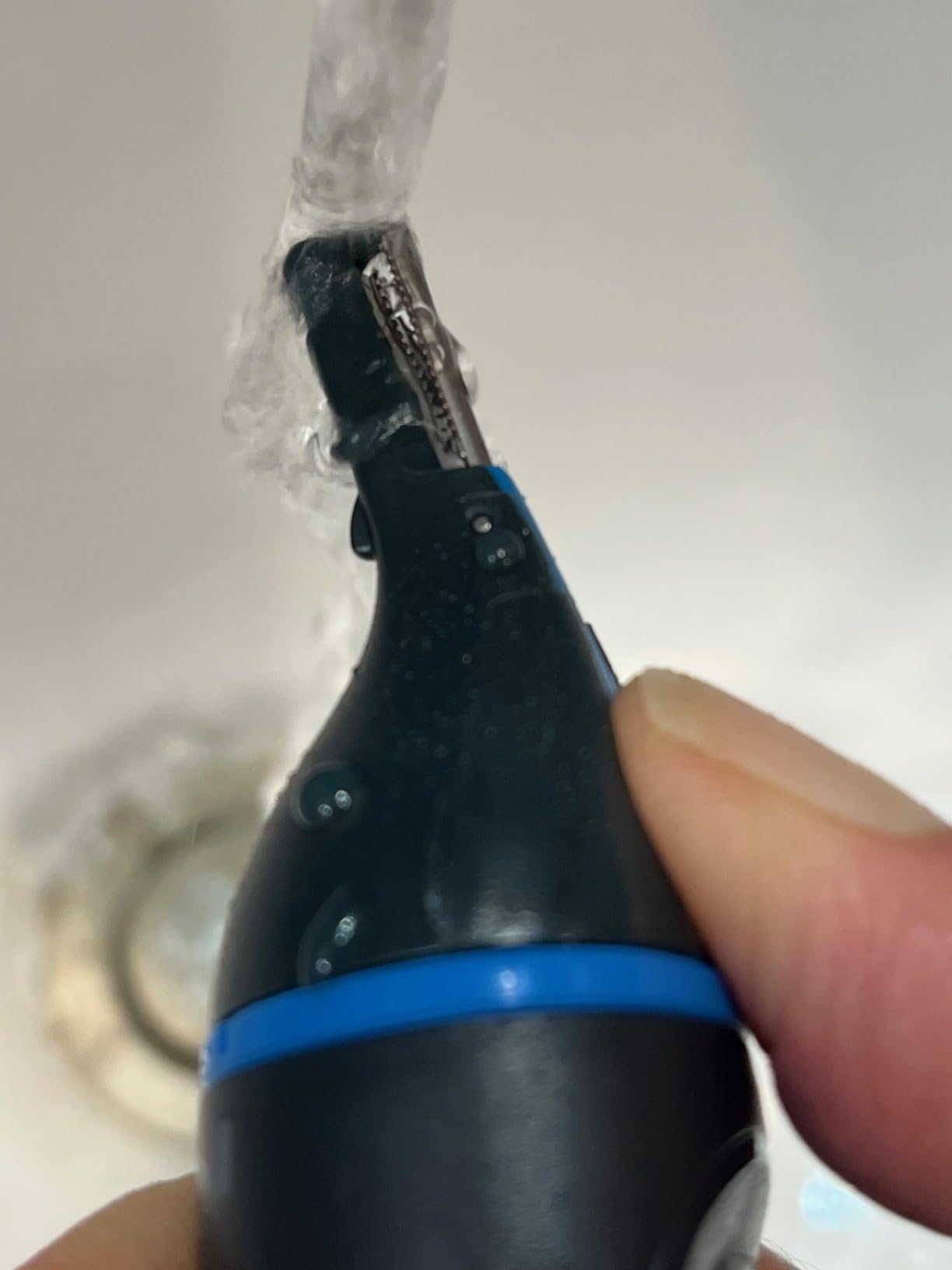 Remington Nose, Ear & Eyebrow Trimmer, Waterproof Groomer - CLEANBoost Easy-Clean System, Rotary and Detail Heads, Eyebrow Comb Included, for wet or dry facial hair detailing customer photo 2