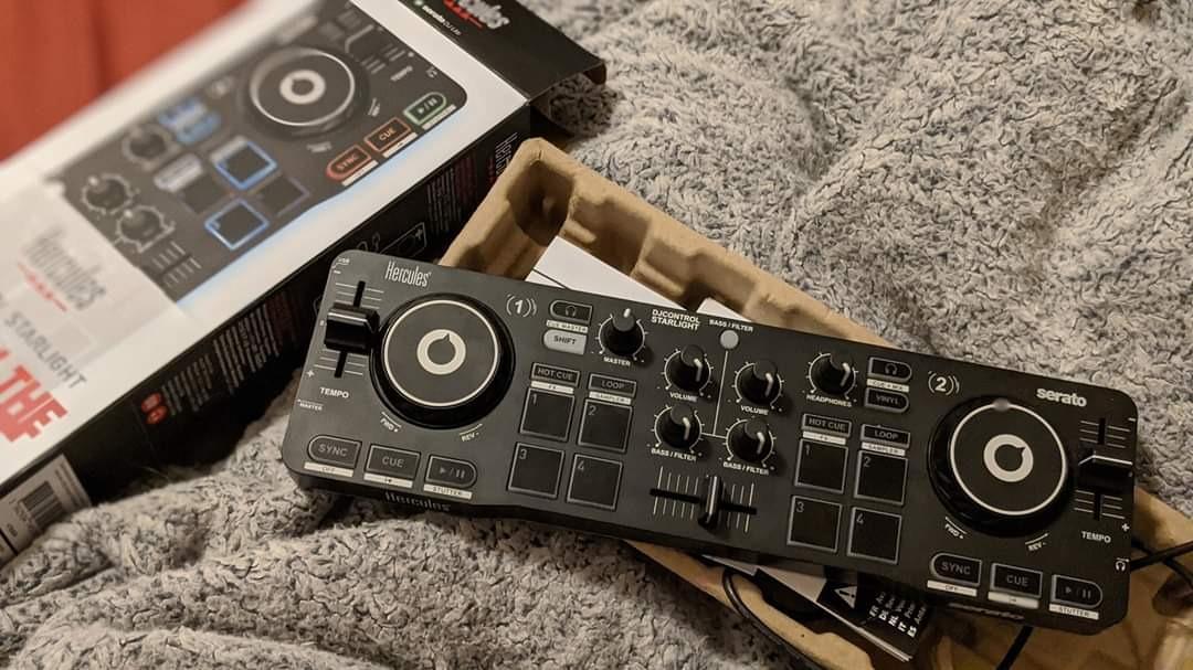 Hercules DJControl Starlight | Pocket USB DJ Controller with Serato DJ Lite, Touch-Sensitive Jog Wheels, Built-in Sound Card and Built-in Light Show | Ultra-compact 2-channel DJ controller with Serato DJ Lite, touch-sensitive jog wheels, RGB lighting, and built-in audio customer photo 1