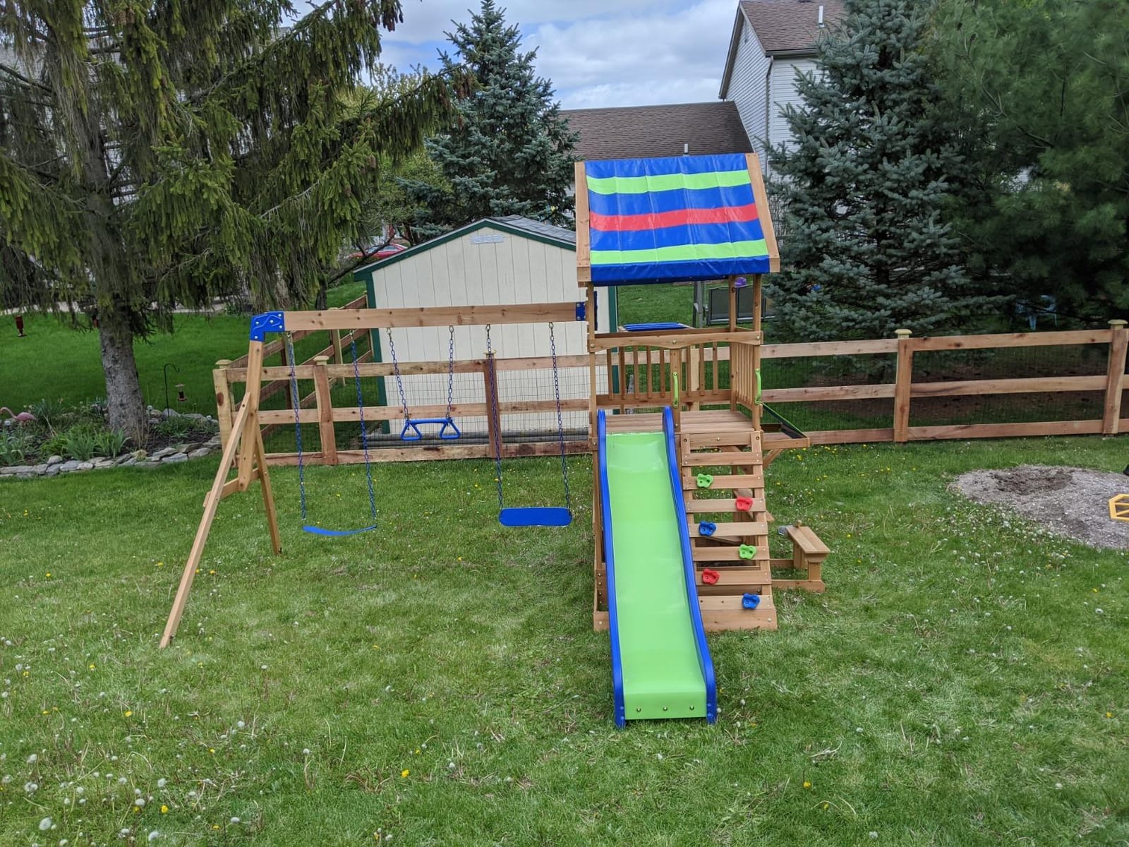 Backyard Discovery Belmont Cedar Wood Swing Set with Wave Slide, Play Deck, Rock Wall Ladder, Snack Bar Window, Shaded Picnic Area, Bench, Belt Swings, Trapeze, Sandbox Area, Canopy, Outdoor Playset customer photo 2
