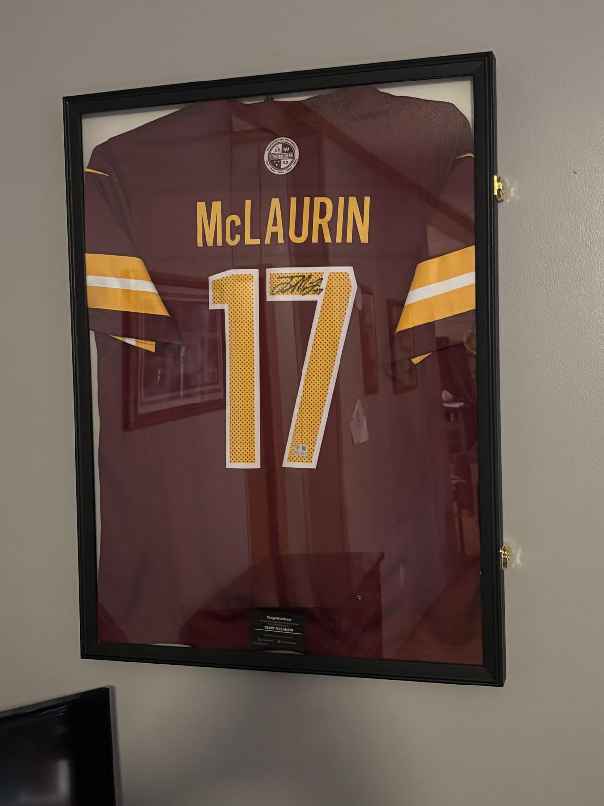 Grintus Jersey Frame Display Case, Black Shadow Box for Sports Jerseys, 1P | Wall Mount, Golden Anti-Theft Latch, UV Protection Acrylic, Hangers & Pin Board for All Sports Jerseys customer photo 1