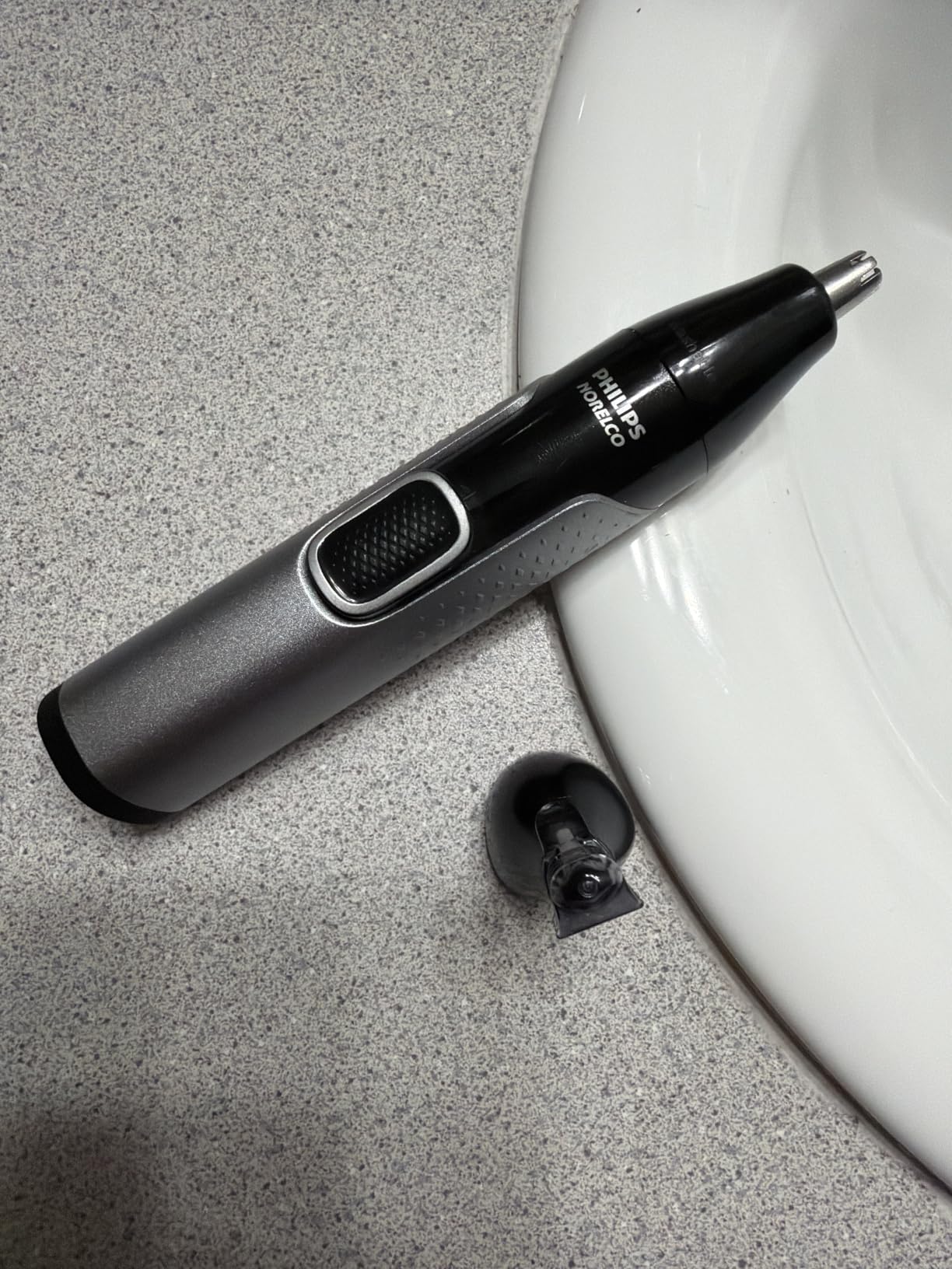 Norelco Philips Nose Trimmer 5000 for Nose, Ears, Eyebrows & Details - Protective Guard System, Dual-Sided Steel Blades, Rotary & Detail Trimmer, Washable, AA Battery, NT5600/62 customer photo 2
