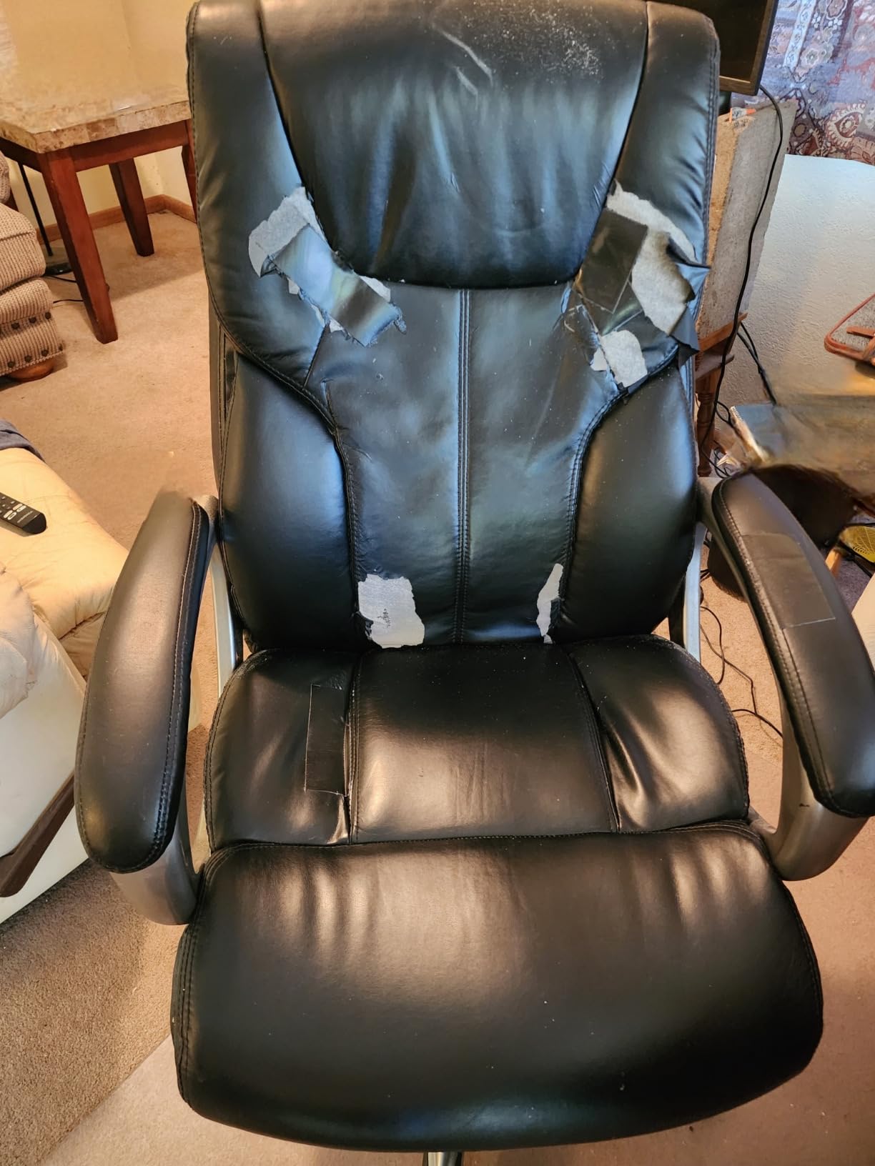 Amazon Basics Executive High Back Office Chair, Adjustable Height, Tilt, Swivel, Padded Seat, Bonded Leather, Wheels, Black/Silver customer photo 2