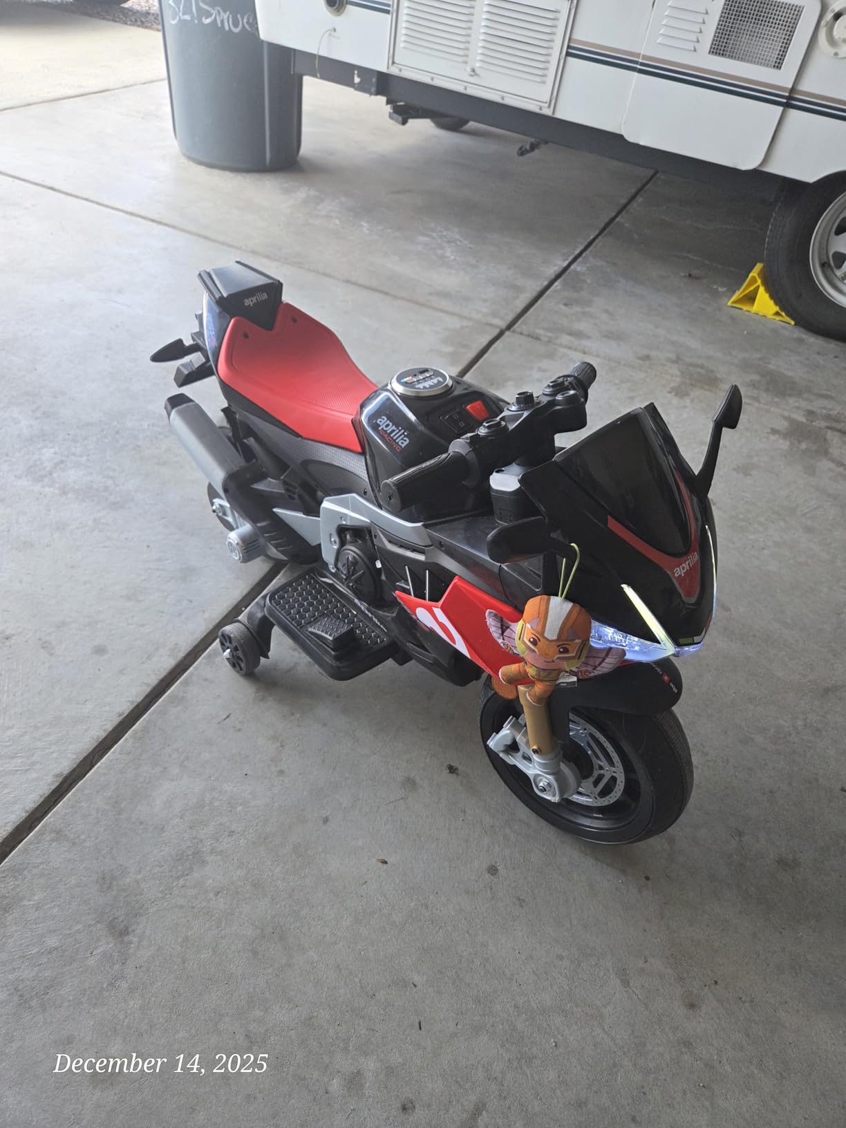TCARAIWEN Aprilia Licensed 24V Kids Electric Motorcycle, Speed Up to 8mph Ride-On Motorcycle with Training Wheels, Key Switch and Mp3 (Normal Motors - 24V, Pink) customer photo 1