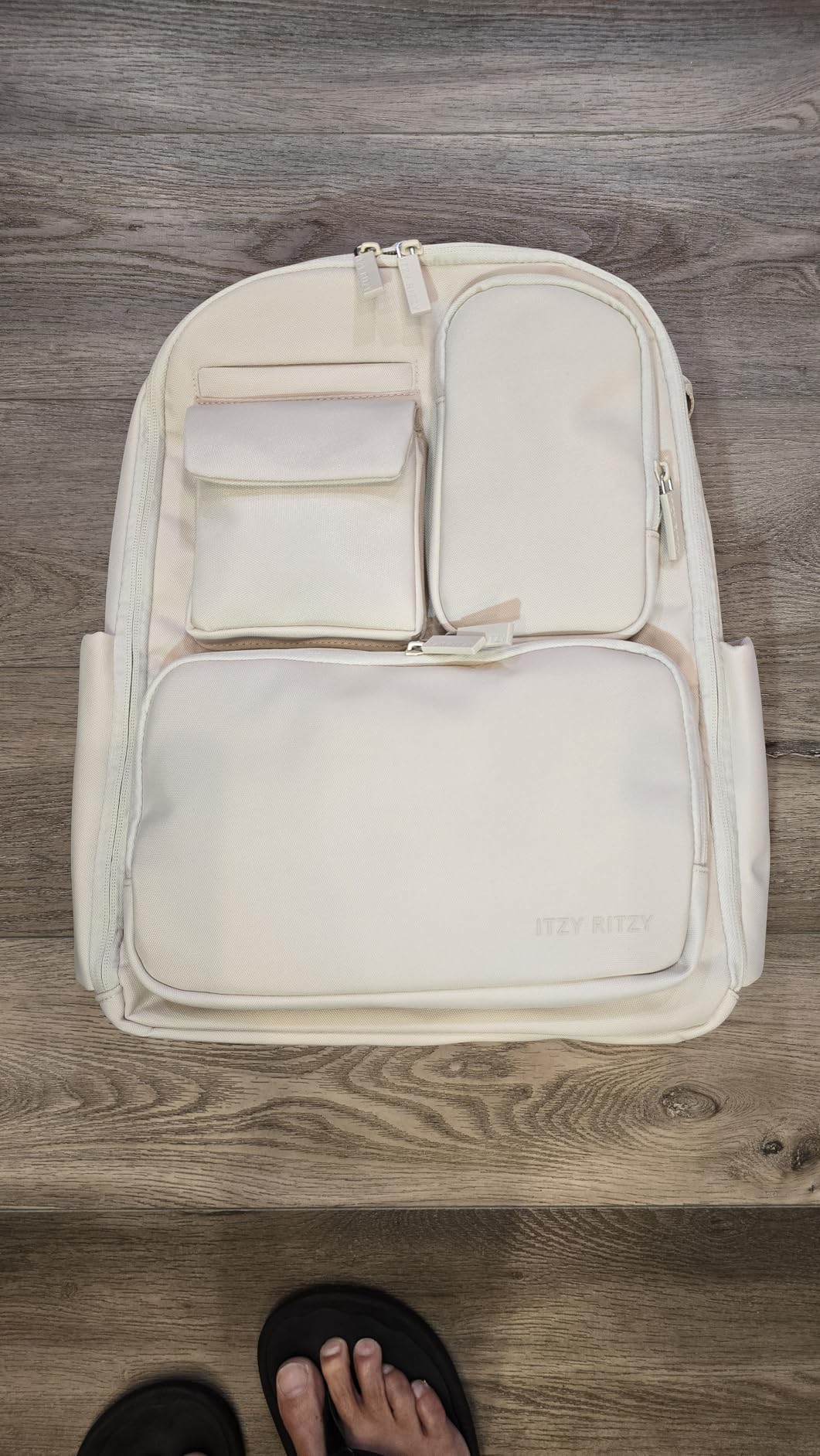 Itzy Ritzy Utility Diaper Bag Backpack, 17 Pockets w/Changing Pad (Black) | Travel-Ready Diaper Backpack with 2 Insulated Bottle Holders, Laptop Compartment, Trolley Sleeve, Straps, and Changing Pad customer photo 1