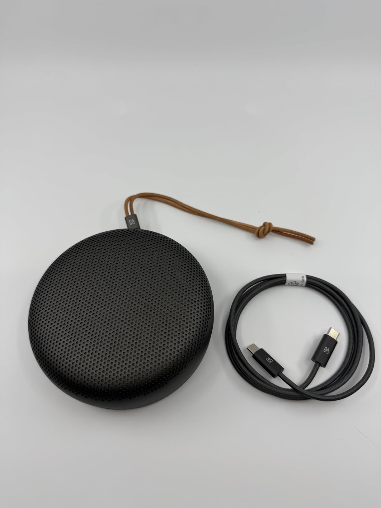 Bang & Olufsen Beosound A1 3rd Gen Portable Waterproof Bluetooth Speaker with 3 Microphones, Cradle to Cradle (C2C) Certified, Rustic Red customer photo 2