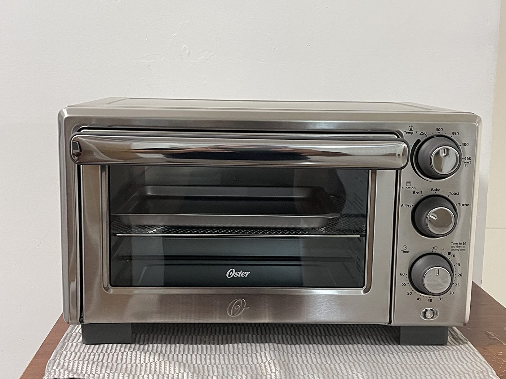 Oster Compact Air Fryer Toaster Oven. Convection Countertop Pizza Oven, 4-Slice Toaster with 5 Cooking Functions - Air Fry, Bake, Toast, Broil, and Warm customer photo 1