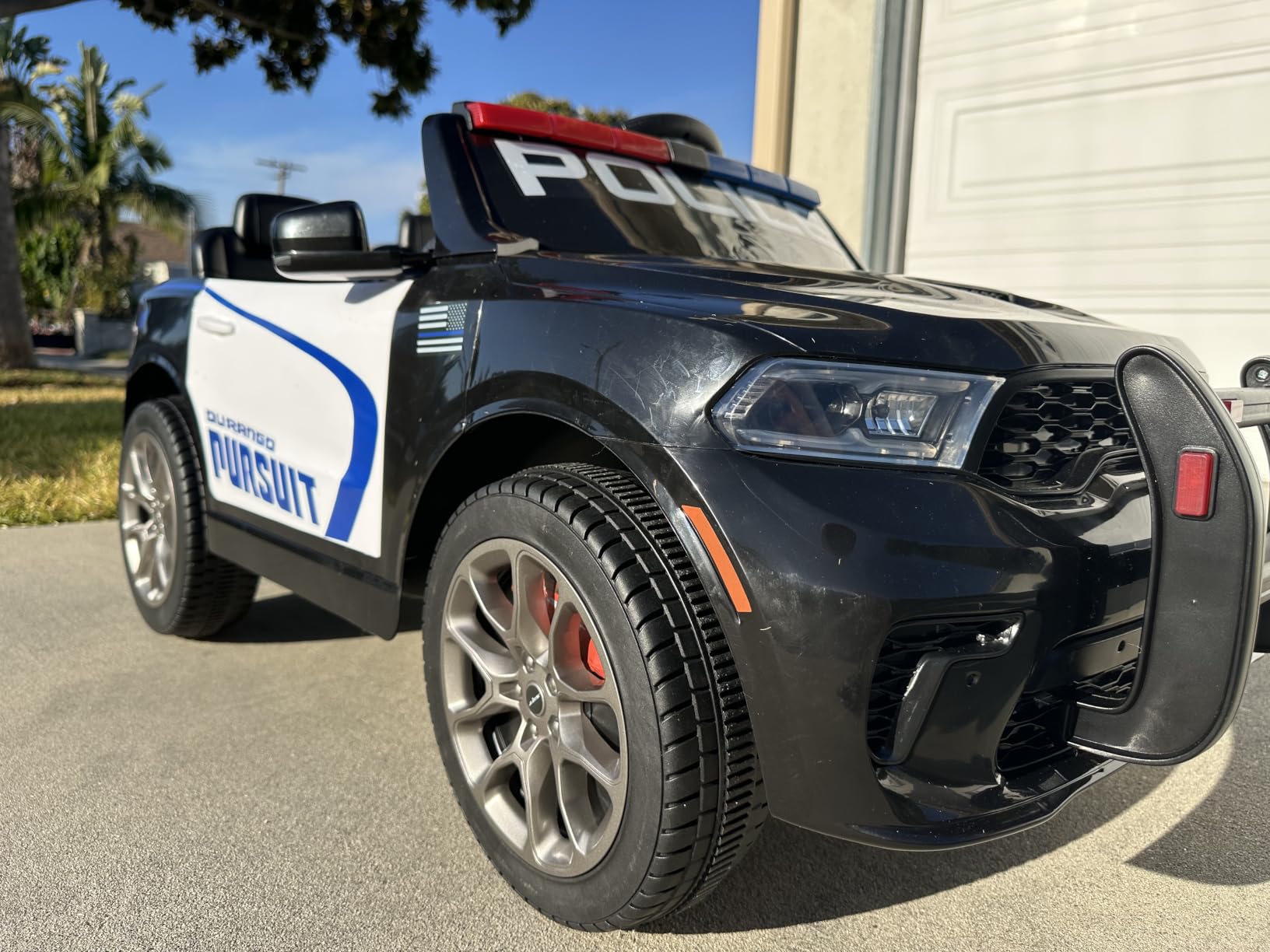 Licensed Dodge Durango Pursuit 12V Police Ride On Car for Kids | 2 Seater Kids Car with Dual 390 Motors, Parent Remote, Flashing Police Lights, Megaphone, Music, Soft Start and Power Display customer photo 1