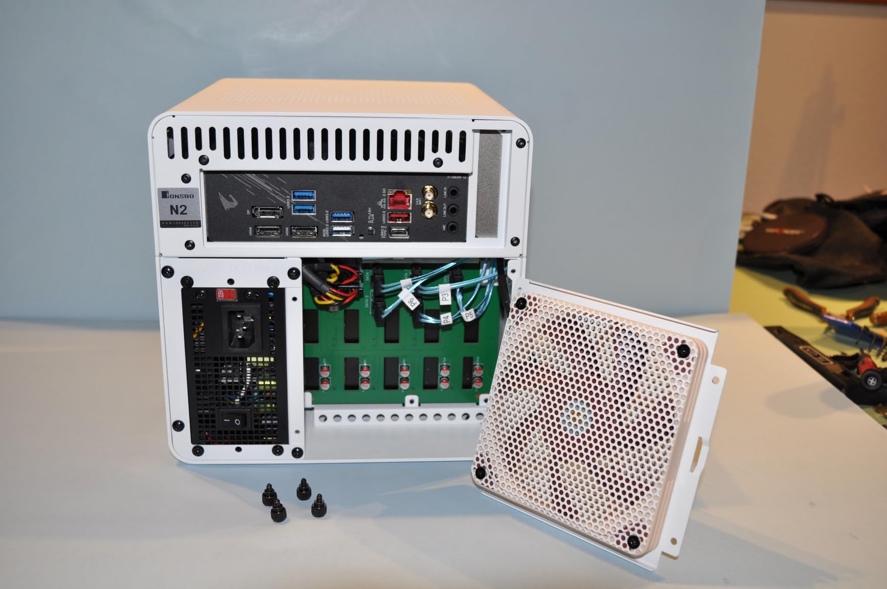 JONSBO N2 Black NAS ITX Case 5+1 Disk Bays Mini Aluminum Case, Built-in 12cm Fan, SFX Power Bite (L150mm Max.), Support 65mm CPU Cooler, Integrated Upper Cover Removable,Black customer photo 1