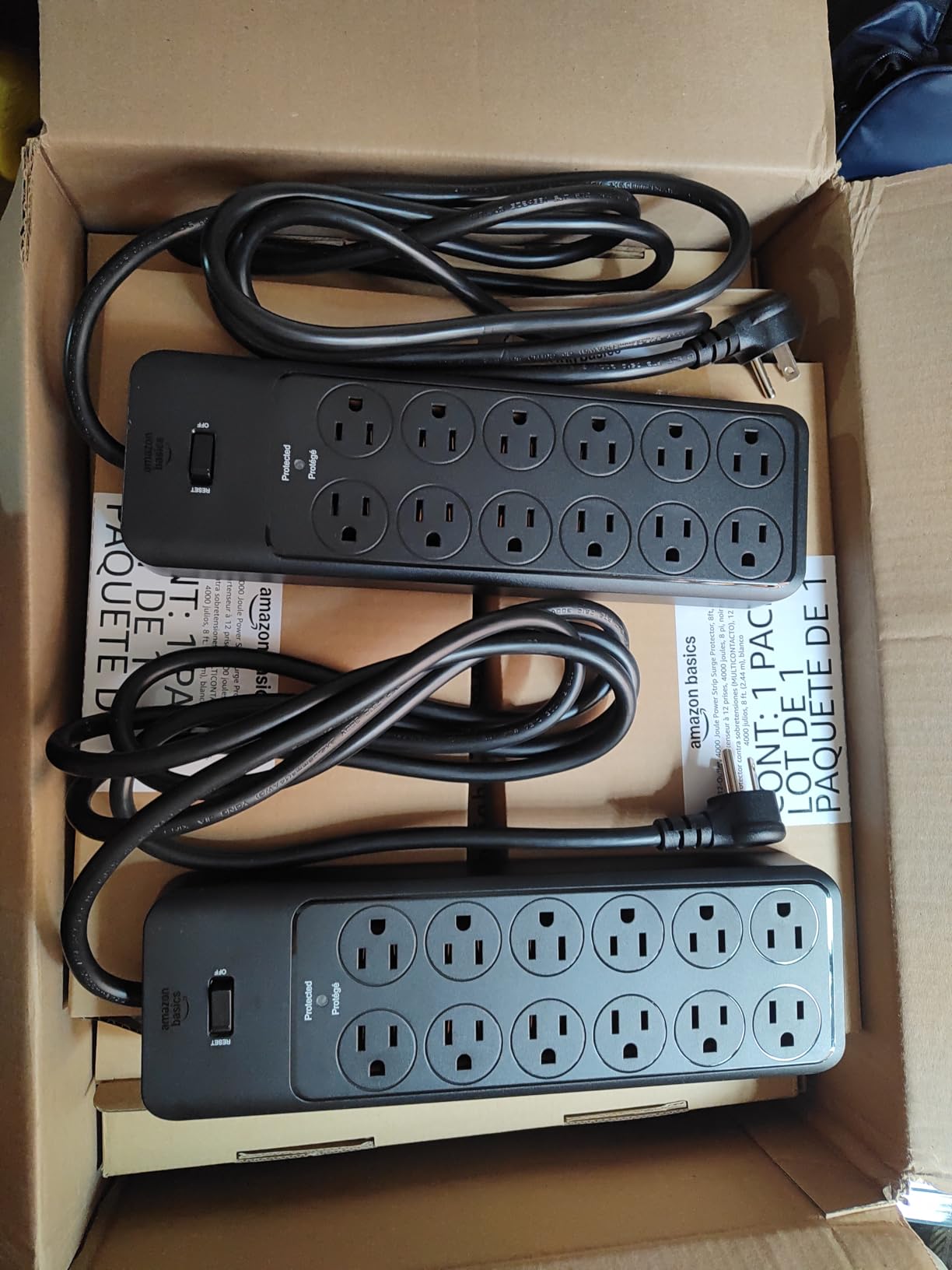 Amazon Basics 12-Outlet Surge Protector Power Strip, 4000 Joules, 8ft Extension Cord, Rectangle, for Home, Office, Gaming Room, Black customer photo 2