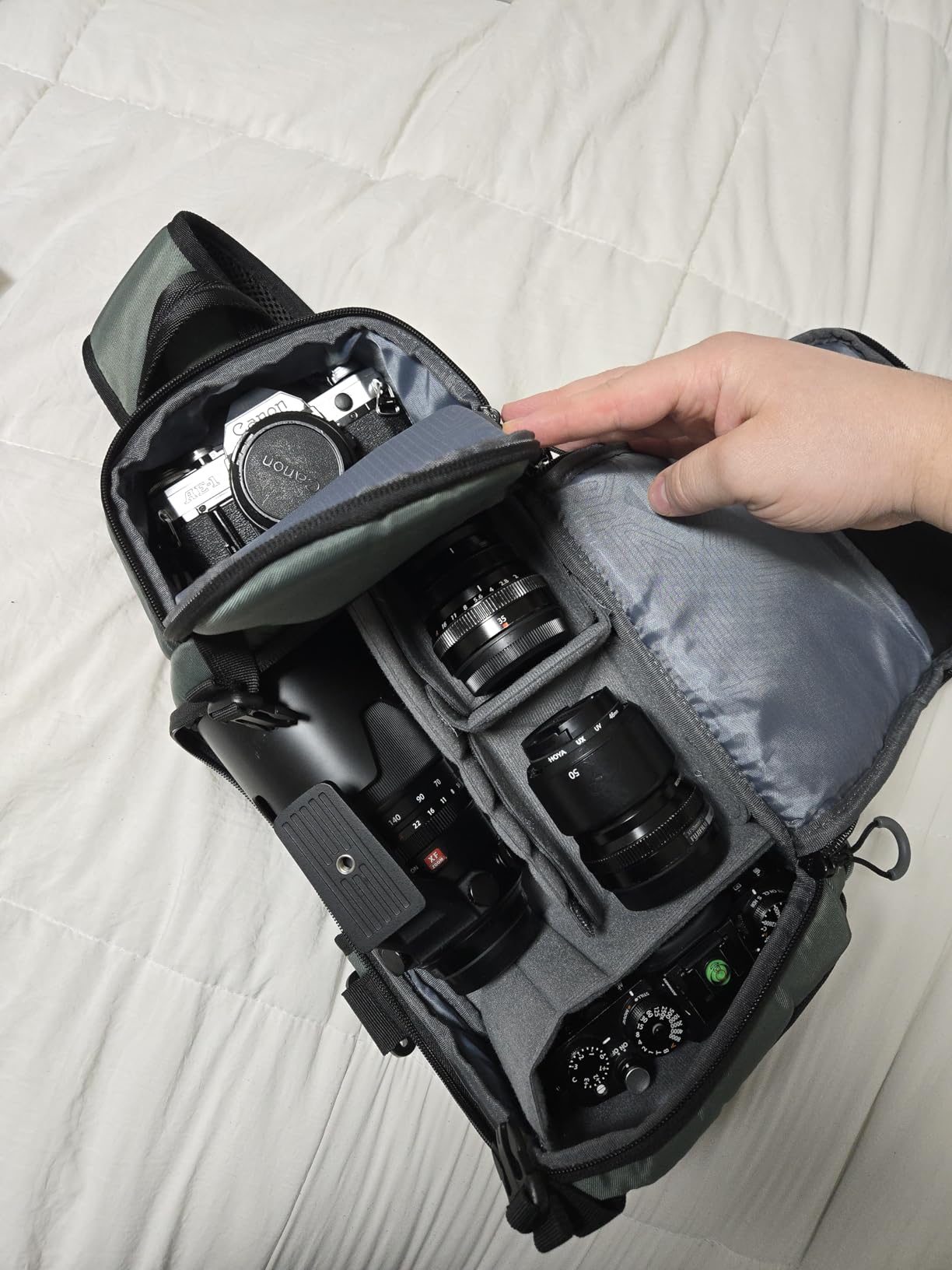 K&F CONCEPT Hardshell Camera Sling Bag, 10L EVA Case with Tripod Holder | EVA hardshell Camera Sling. Fits Mirrorless & Small DSLR. 5 Padded Dividers. Strap 33-43.7 in. Water & shock proof. customer photo 1