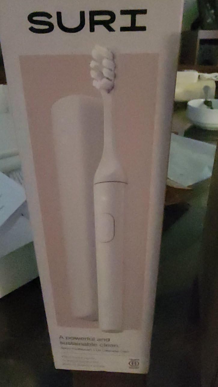 SURI Pro Sonic Electric Toothbrush | Over 4+ Weeks Battery | UV Cleaning Travel Case | Pressure Sensor | Aluminium Body | 2-Minute Timer | Plant-Based Head | Green customer photo 2