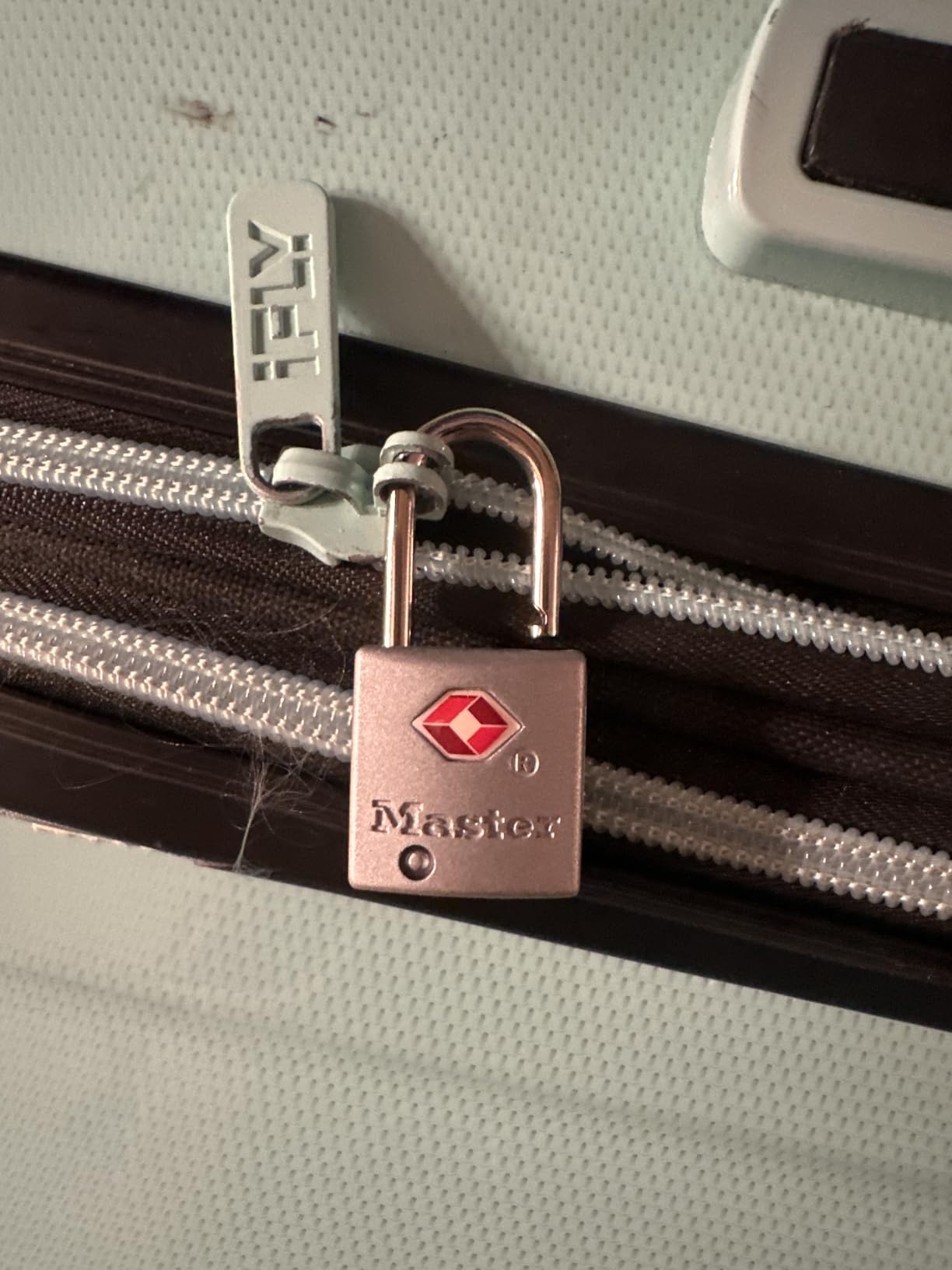 Master Lock TSA Luggage Lock Keyed Alike, Brass and Nickel, 4-Pack 4683Q customer photo 1