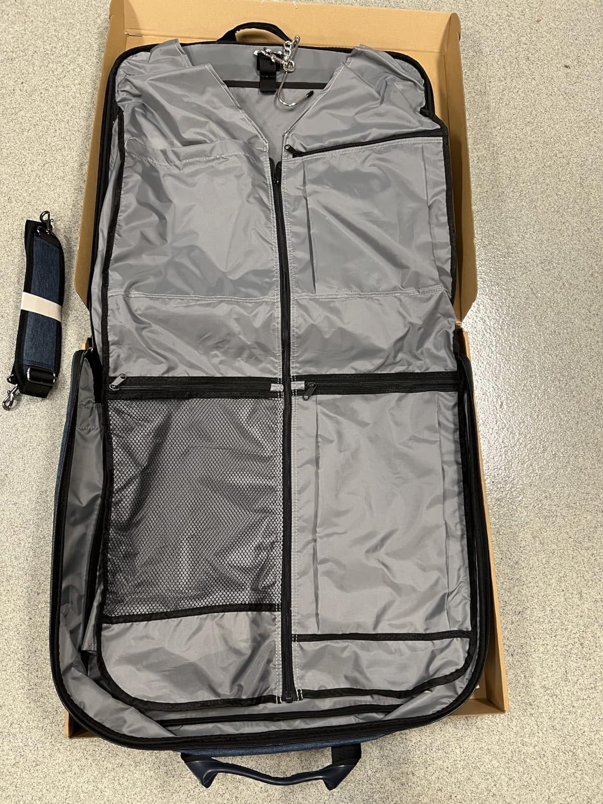 Amazon Basics Carry-On Garment Bag for Travel and Business Trips with Detachable Shoulder Strap, Hanging Suit Luggage, Wrinkle Free Cover for Suits Dresses Coats, Foldable with Shoe Compartment, Gray customer photo 2