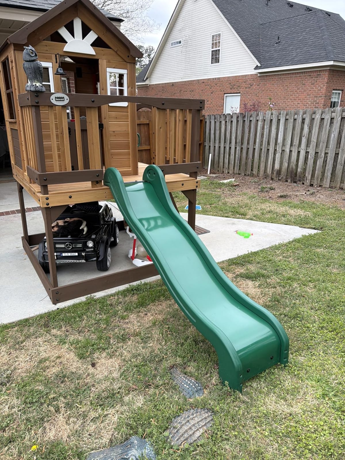 Backyard Discovery Beacon Heights Elevated Cedar Wooden Kids Playhouse with Wave Slide, Play Kitchen, Wrap-Around Deck, Flat-Step Ladder, Half Door, Windows, Bell, and Growth Chart for Outdoor Play customer photo 1
