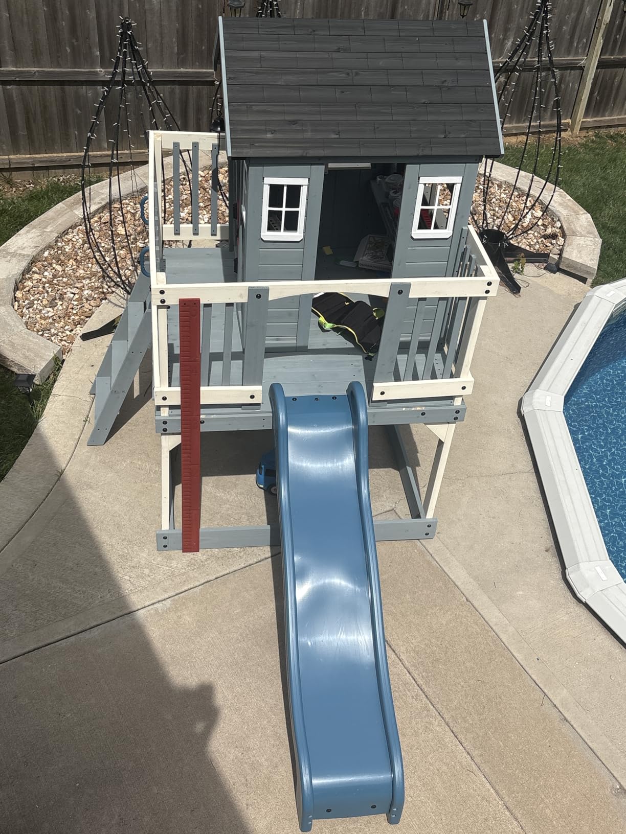 Backyard Discovery Beacon Heights Elevated Cedar Wooden Kids Playhouse with Wave Slide, Play Kitchen, Wrap-Around Deck, Flat-Step Ladder, Half Door, Windows, Bell, and Growth Chart for Outdoor Play customer photo 2