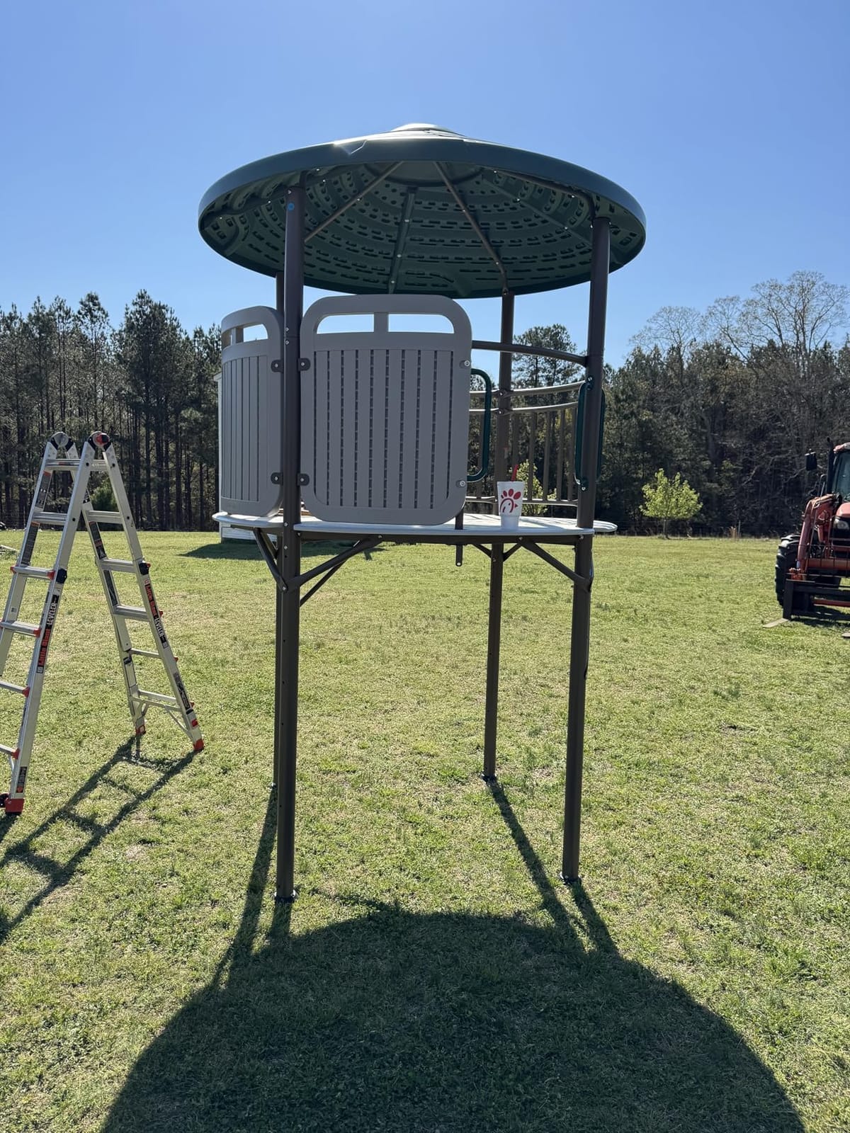 Lifetime Adventure Tower Deluxe Swing Set Playset Lifetime Adventure Tower, Covered Clubhouse, 9 ft Wavy Slide, Monkey Bars, Climbing Wall, Fireman’s Pole, Belt Swings & Trapeze customer photo 1