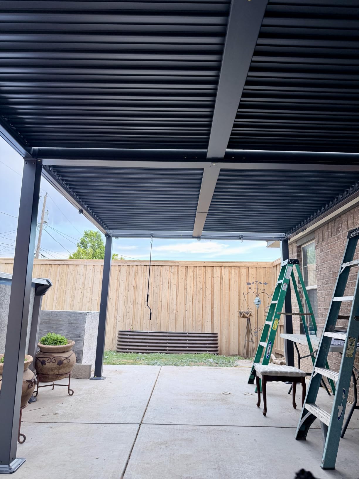 EROMMY Louvered Pergola 10x10, Outdoor Aluminum Pergola with Adjustable Rainproof Roof for Garden, Patio, Deck, Waterproof Curtains and Netting Included, White customer photo 1