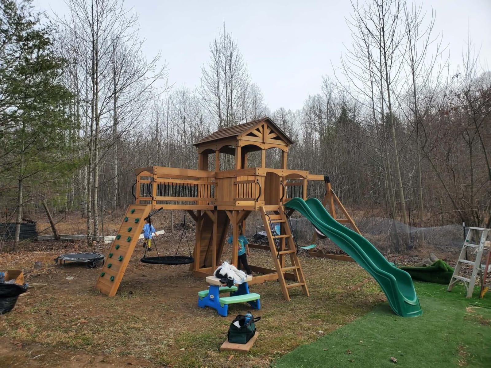 Backyard Discovery Dover Bay Spruce Wood Swing Set with Wave Slide, Clubhouse, Monkey Bars, Rock Wall, Belt Swings, Step Ladder, Toy Telescope, Chalkboard, Outdoor Playset customer photo 1